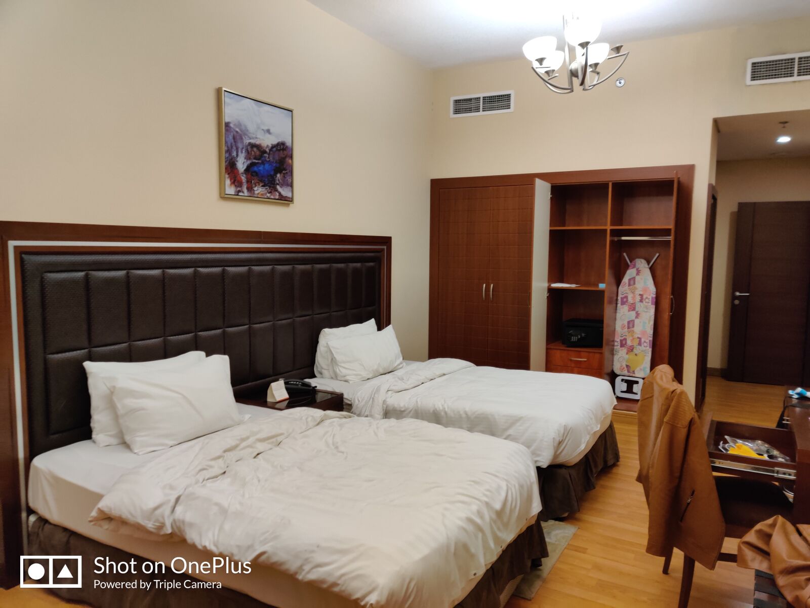 OnePlus HD1911 sample photo. Hotel room, beds, cusion photography