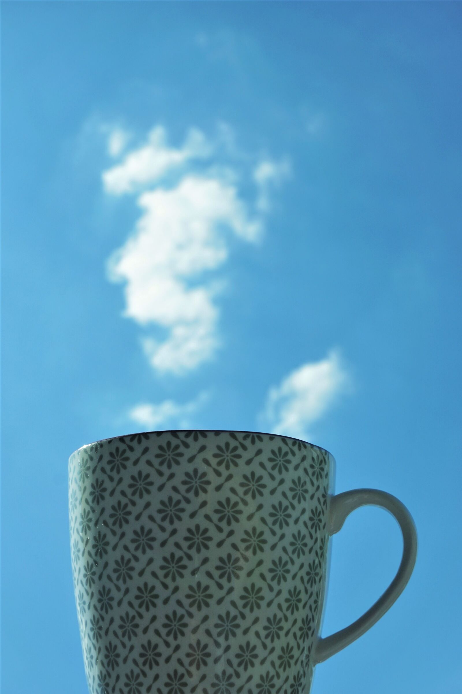 Sony a6000 sample photo. Cup, clouds, steam photography