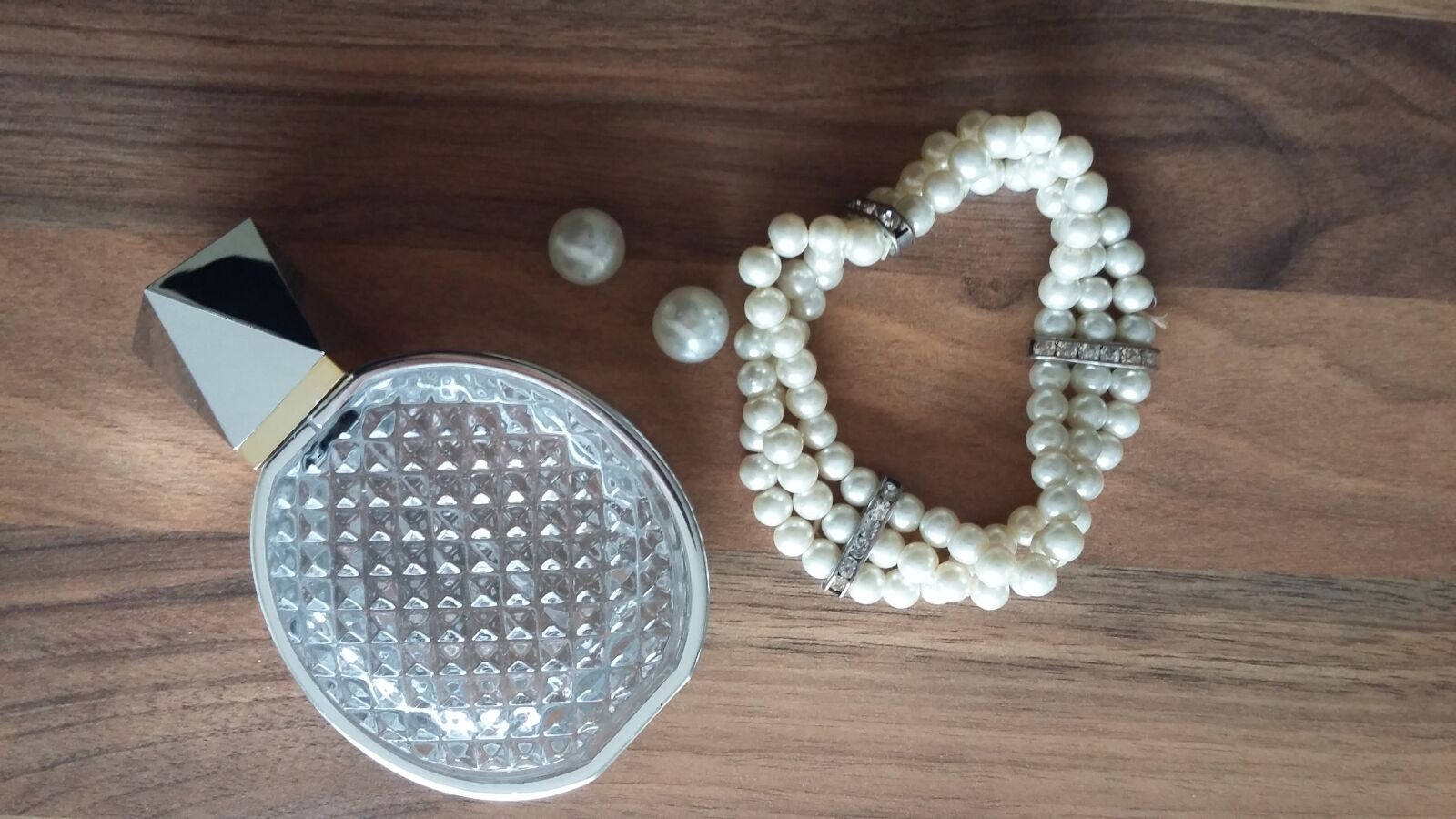 Samsung Galaxy A3 sample photo. Pearls, bottle, container photography