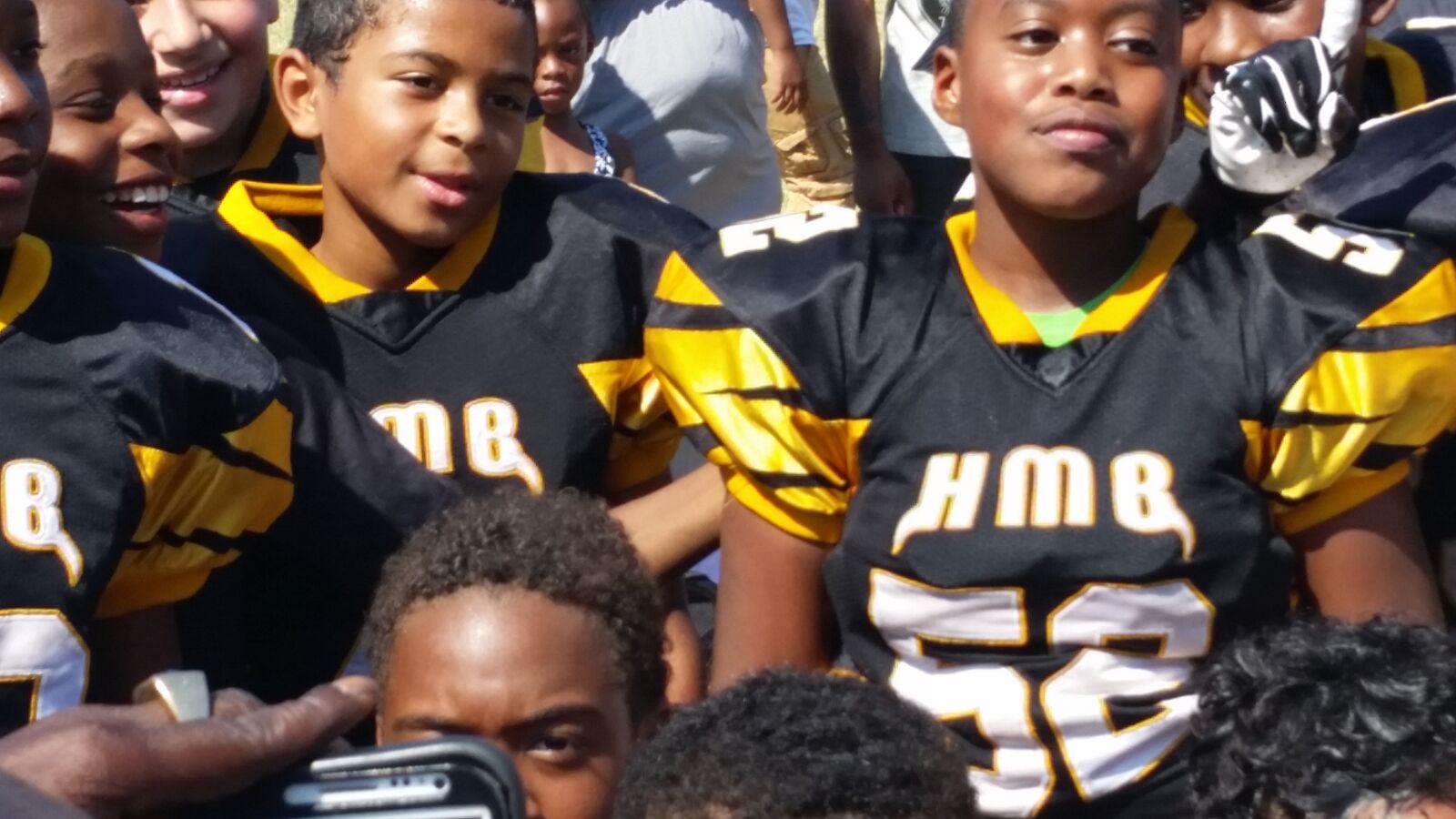 Samsung Galaxy S5 sample photo. Black, uniforms, football, team photography