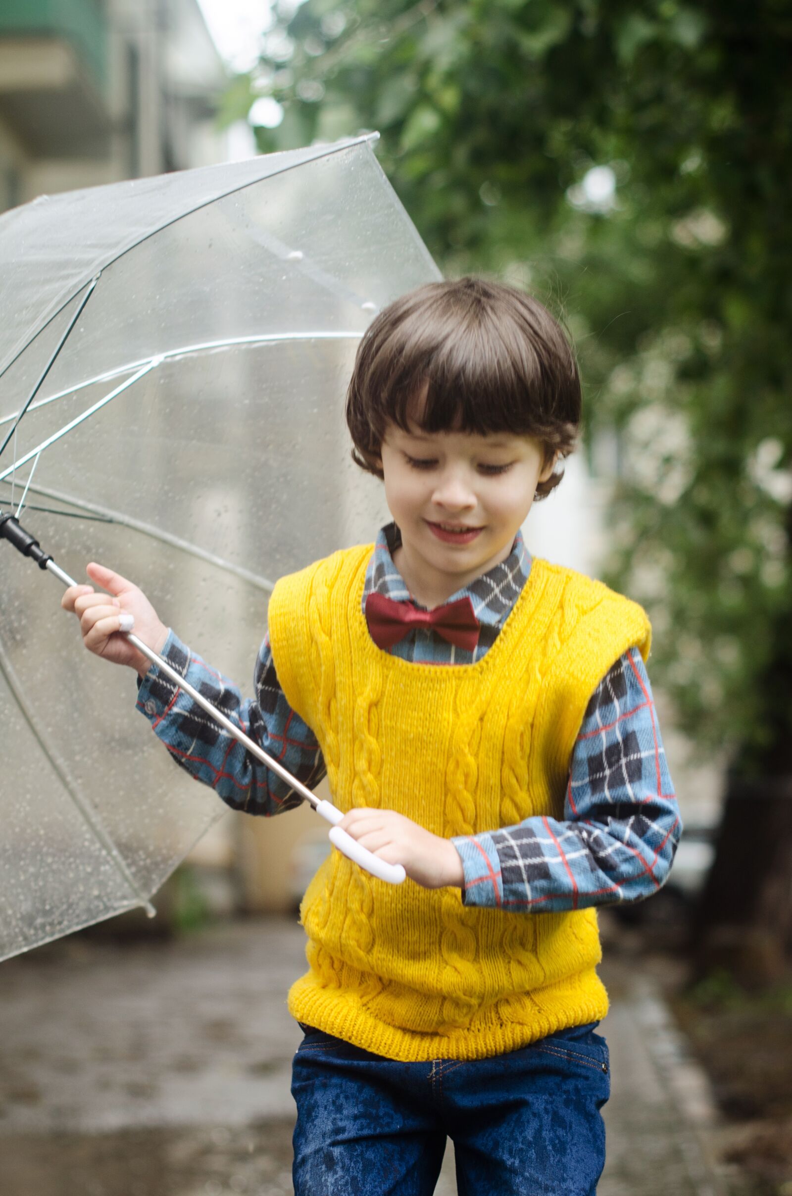 Nikon D5100 sample photo. Umbrella, puddle, kid photography