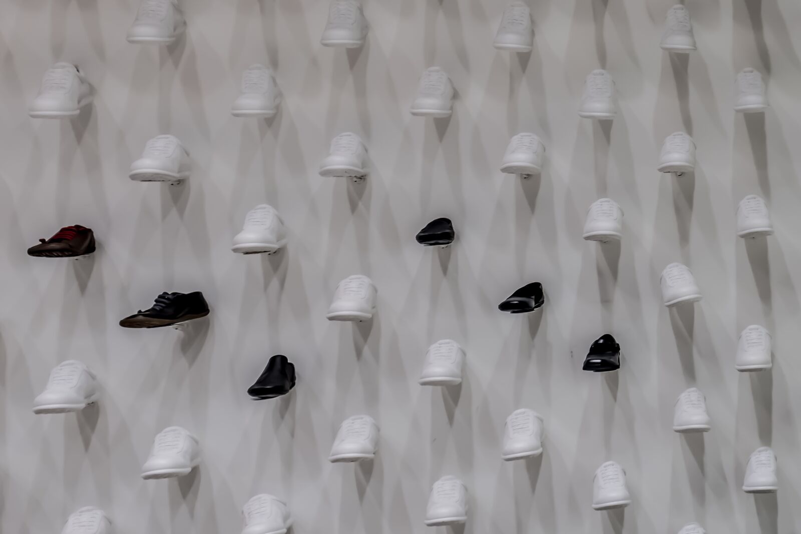 Fujifilm XF 18-55mm F2.8-4 R LM OIS sample photo. Collection, shoes, wall photography