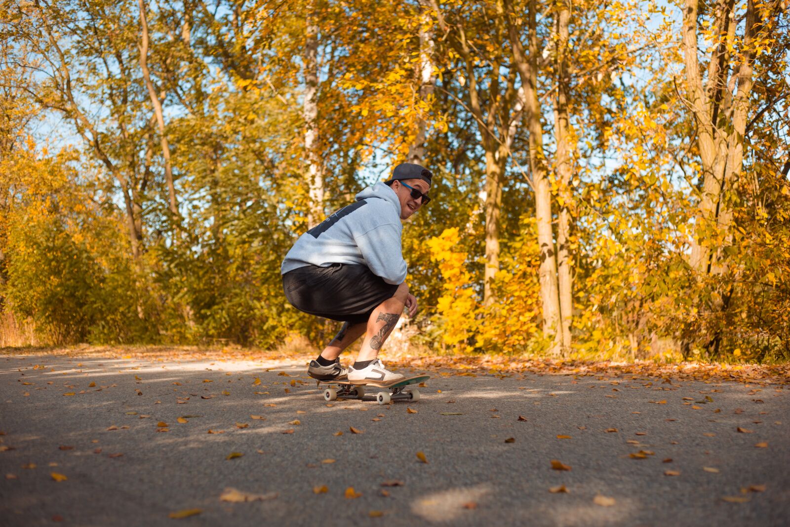 Canon EF 50mm F1.8 II sample photo. Skateboard, man, autumn photography