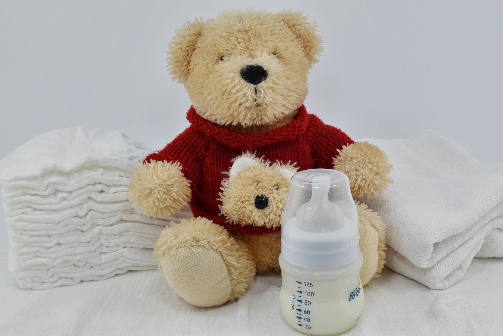Nikon D5500 sample photo. Diaper, milk, newborn, toy photography
