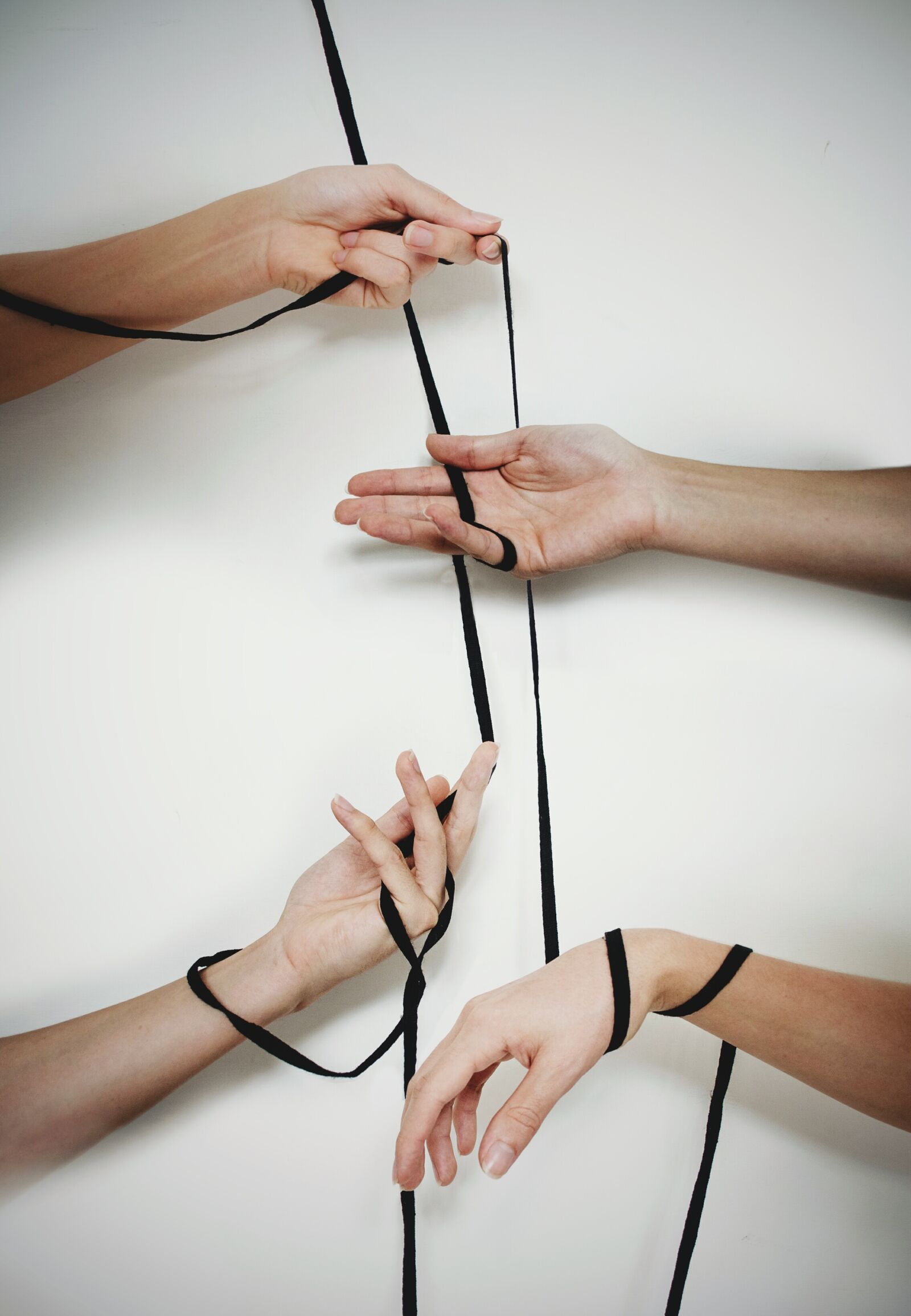 Nikon D5100 sample photo. Hands, cords, lace photography