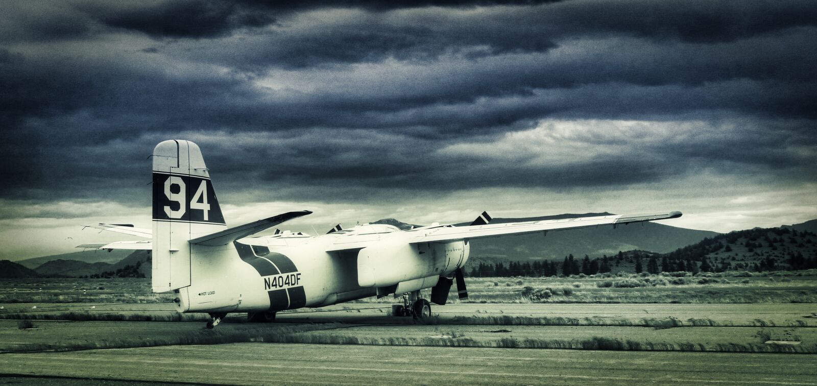 Panasonic DMC-ZS3 sample photo. Airplane, abandoned airfield, dark photography