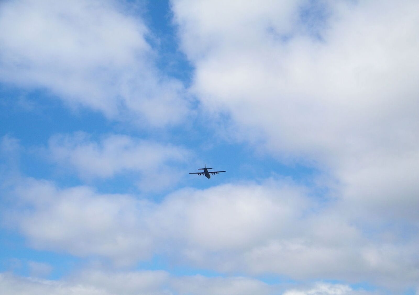 Kodak EASYSHARE Z1015 IS DIGITAL CAMERA sample photo. Plane, flying, clouds photography
