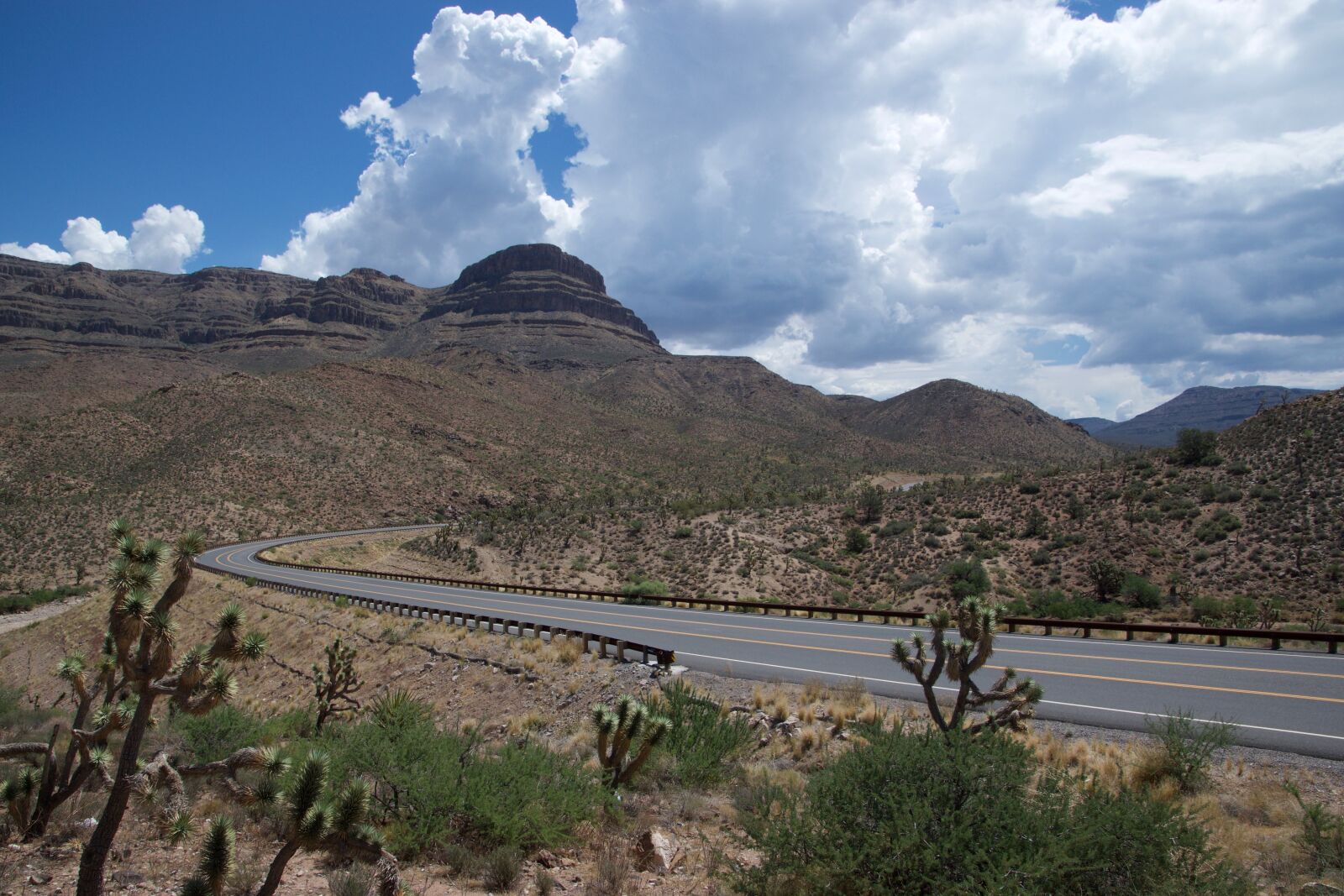 Nikon D5300 sample photo. Road, desert, clouds photography