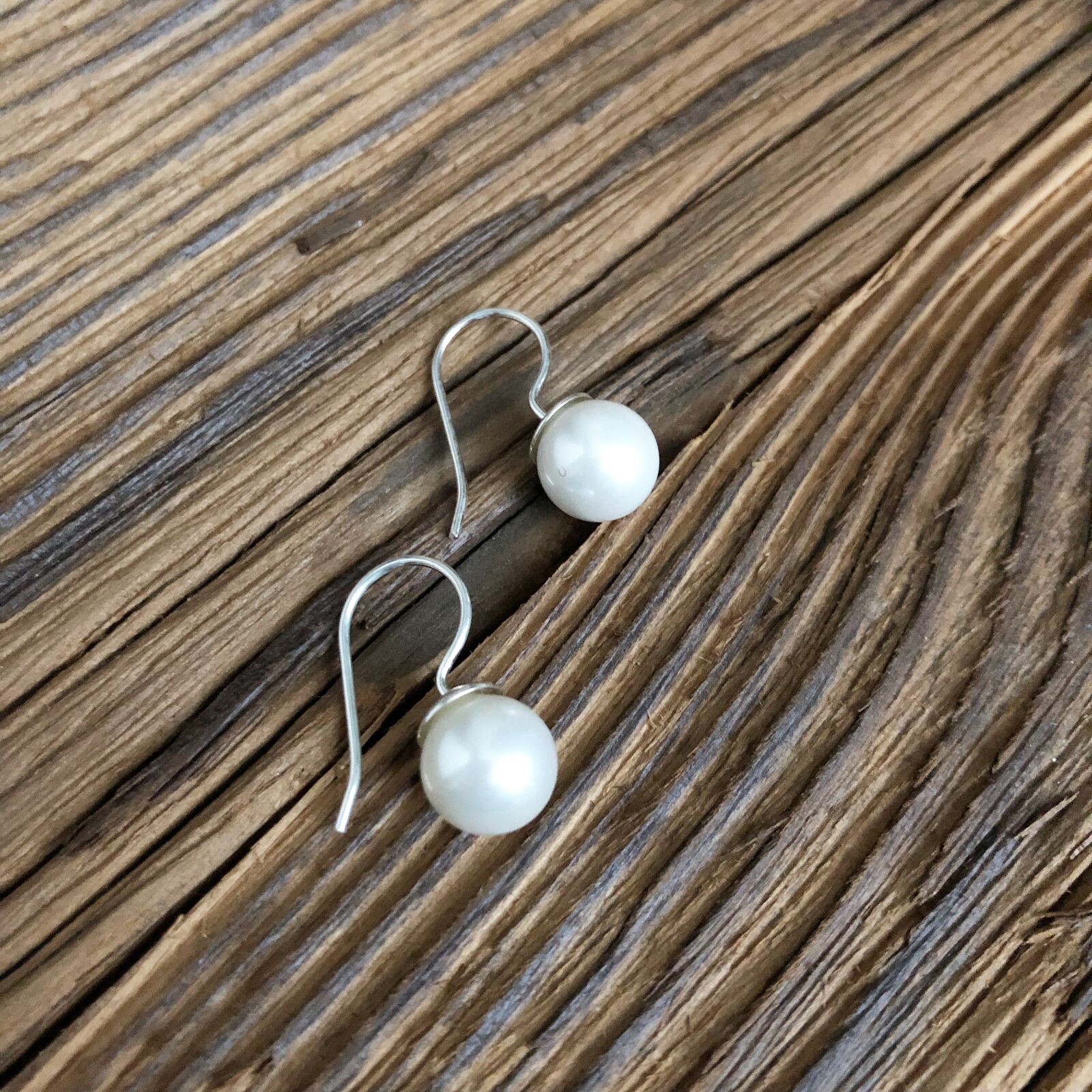 Apple iPhone 8 sample photo. Earrings, pearls, silver photography