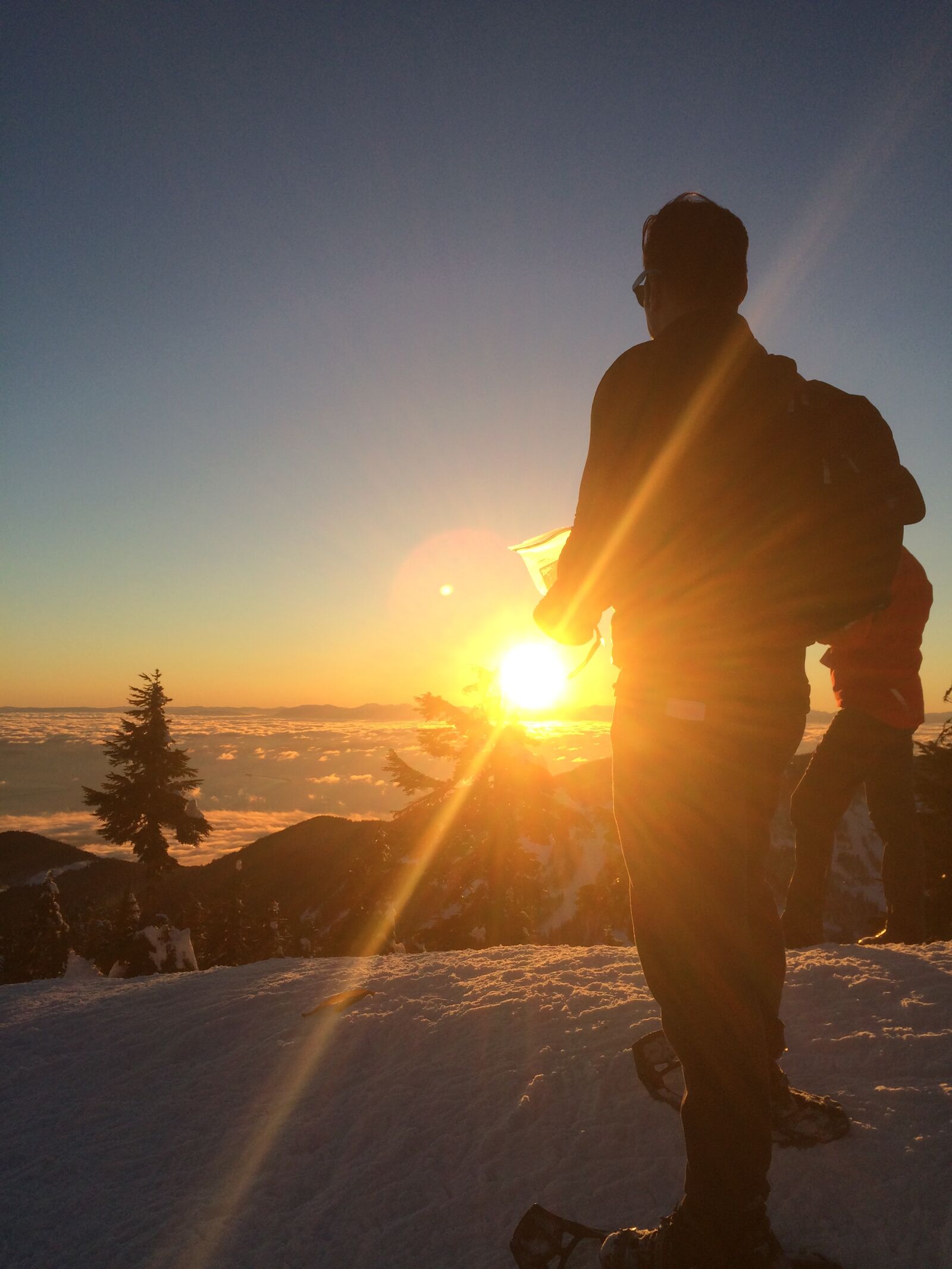 iPhone 5s back camera 4.15mm f/2.2 sample photo. Hiker, snow, sun, sunrise photography