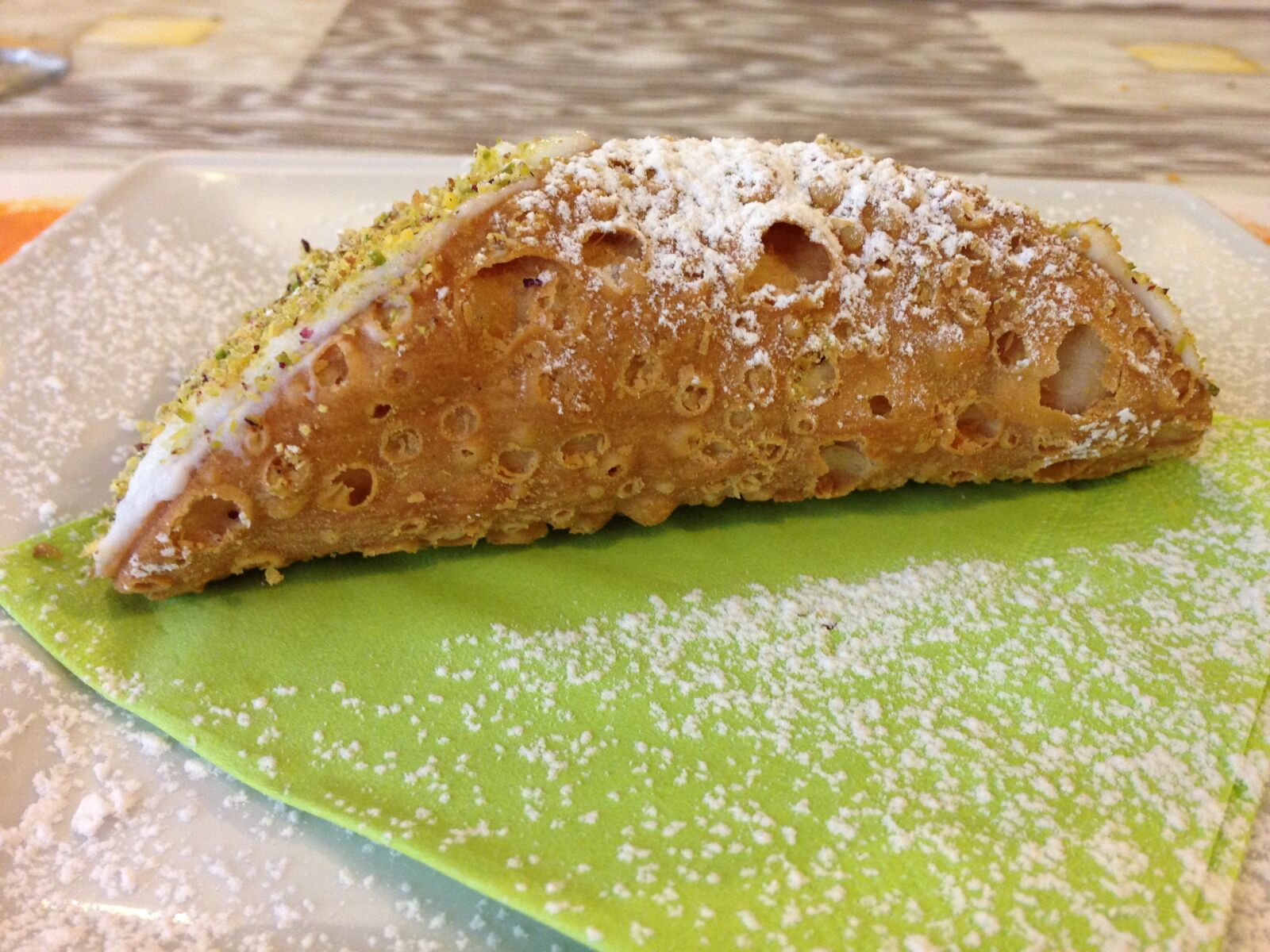iPhone 5 back camera 4.12mm f/2.4 sample photo. Sicilian cannolo, sweet, sicily photography