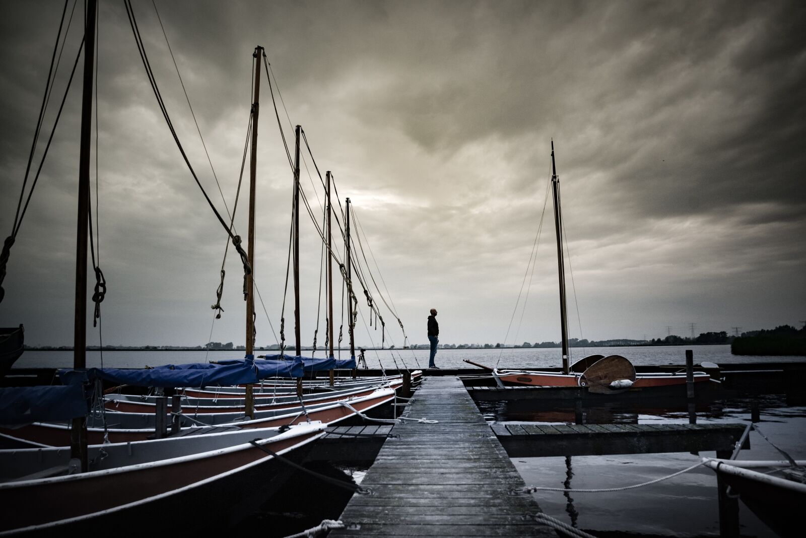Nikon D610 sample photo. Man, standing, harbor photography