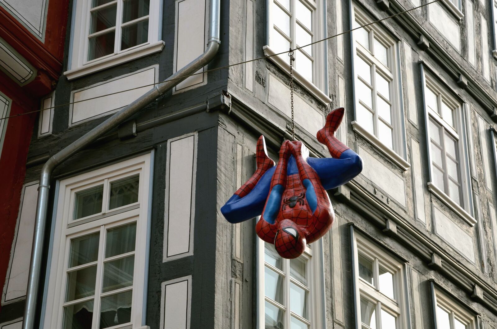 Nikon D5100 sample photo. Acrobats, building, actor, man photography