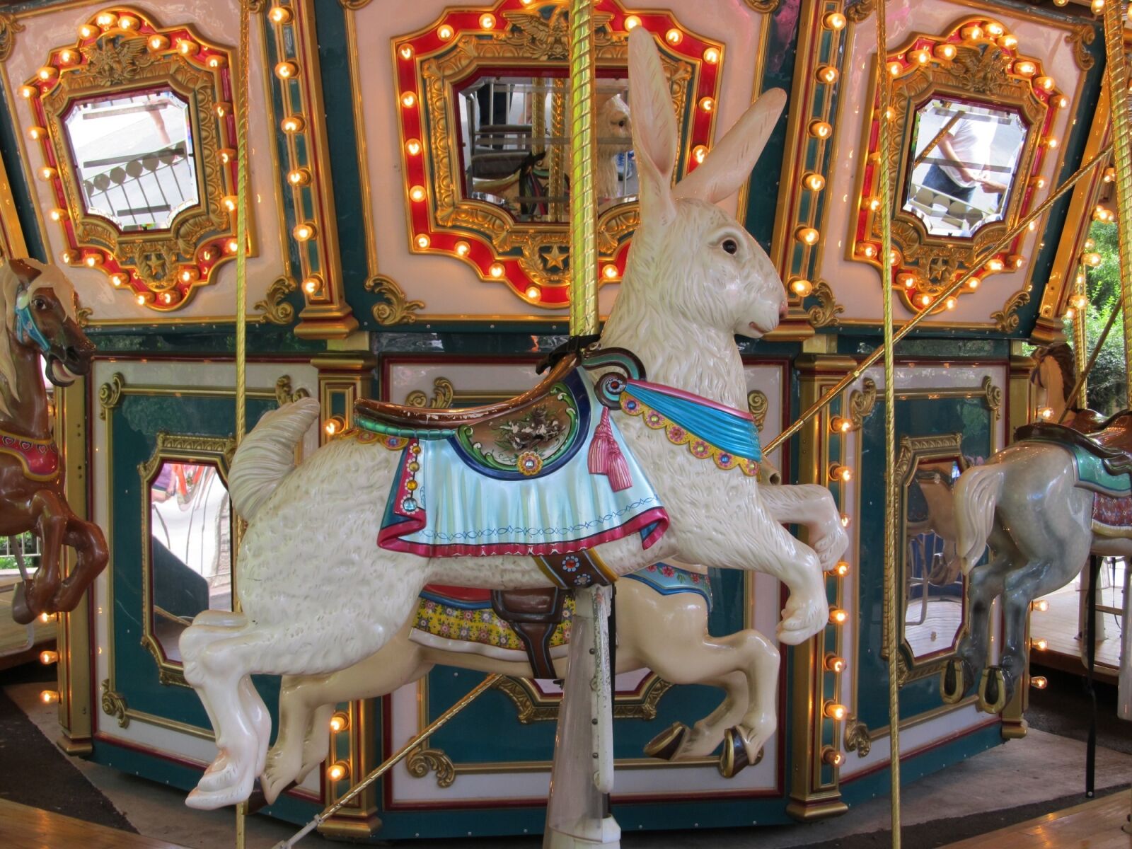 Canon PowerShot SX130 IS sample photo. Wooden rabbit, carousel, merry photography