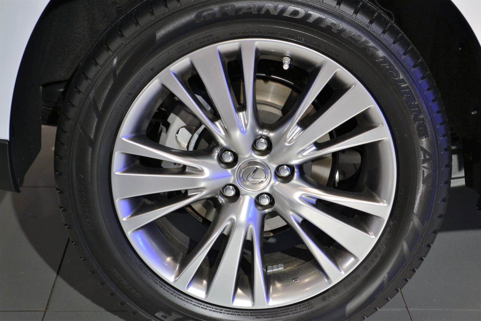 Nikon D3100 sample photo. Lexus wheel base, tire photography