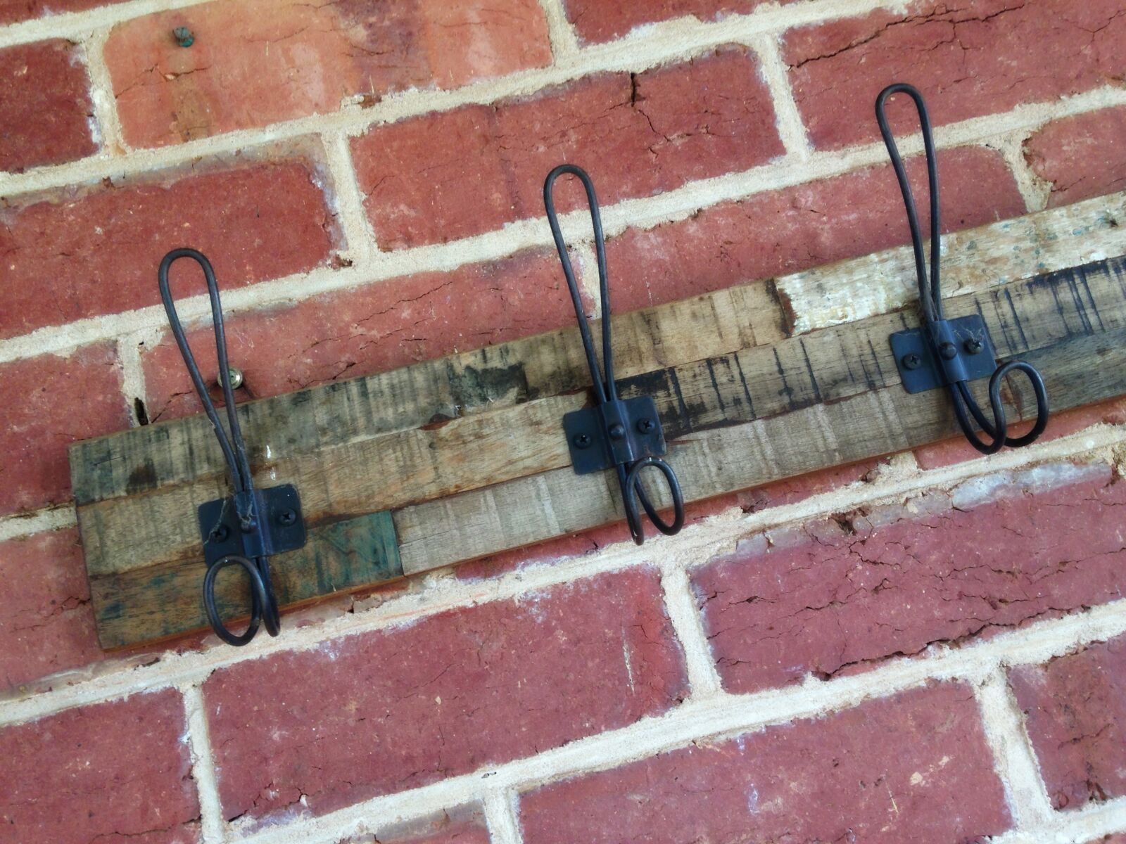 iPhone 5c back camera 4.12mm f/2.4 sample photo. Brick, wall, bricks, hooks photography