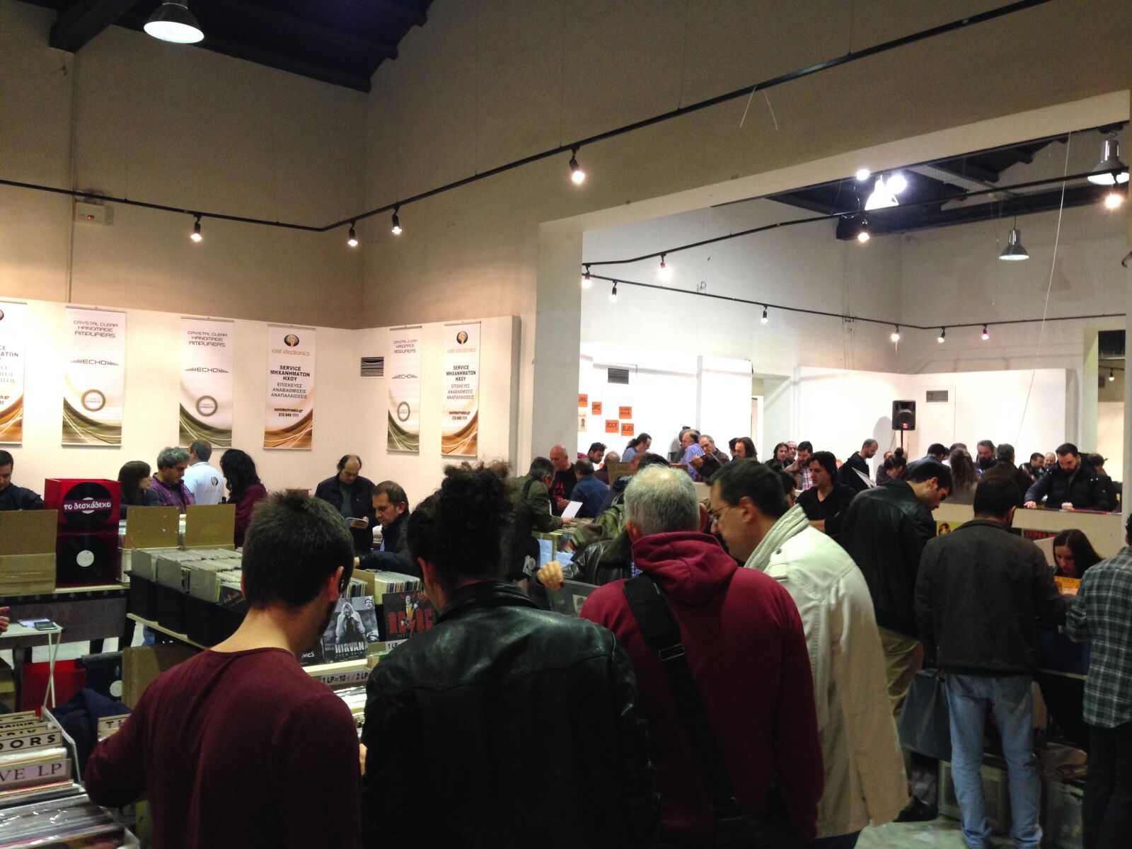 iPhone 5 back camera 4.12mm f/2.4 sample photo. People, vinyl, athens, technopolis photography