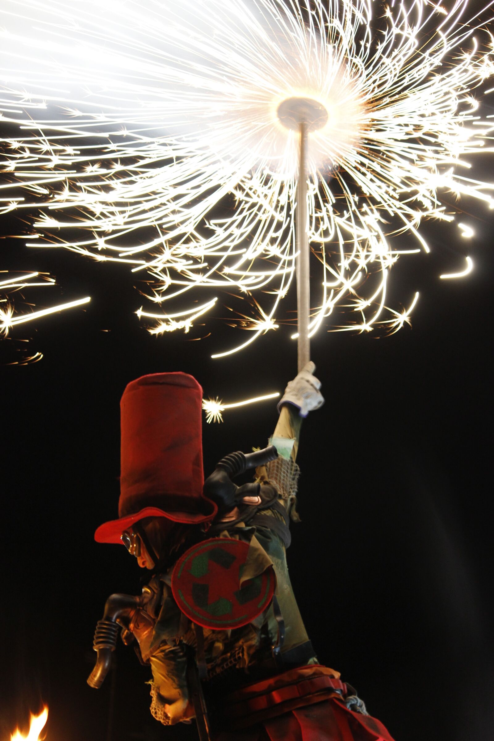 Canon EF-S 55-250mm F4-5.6 IS II sample photo. Costume, madness, fire photography