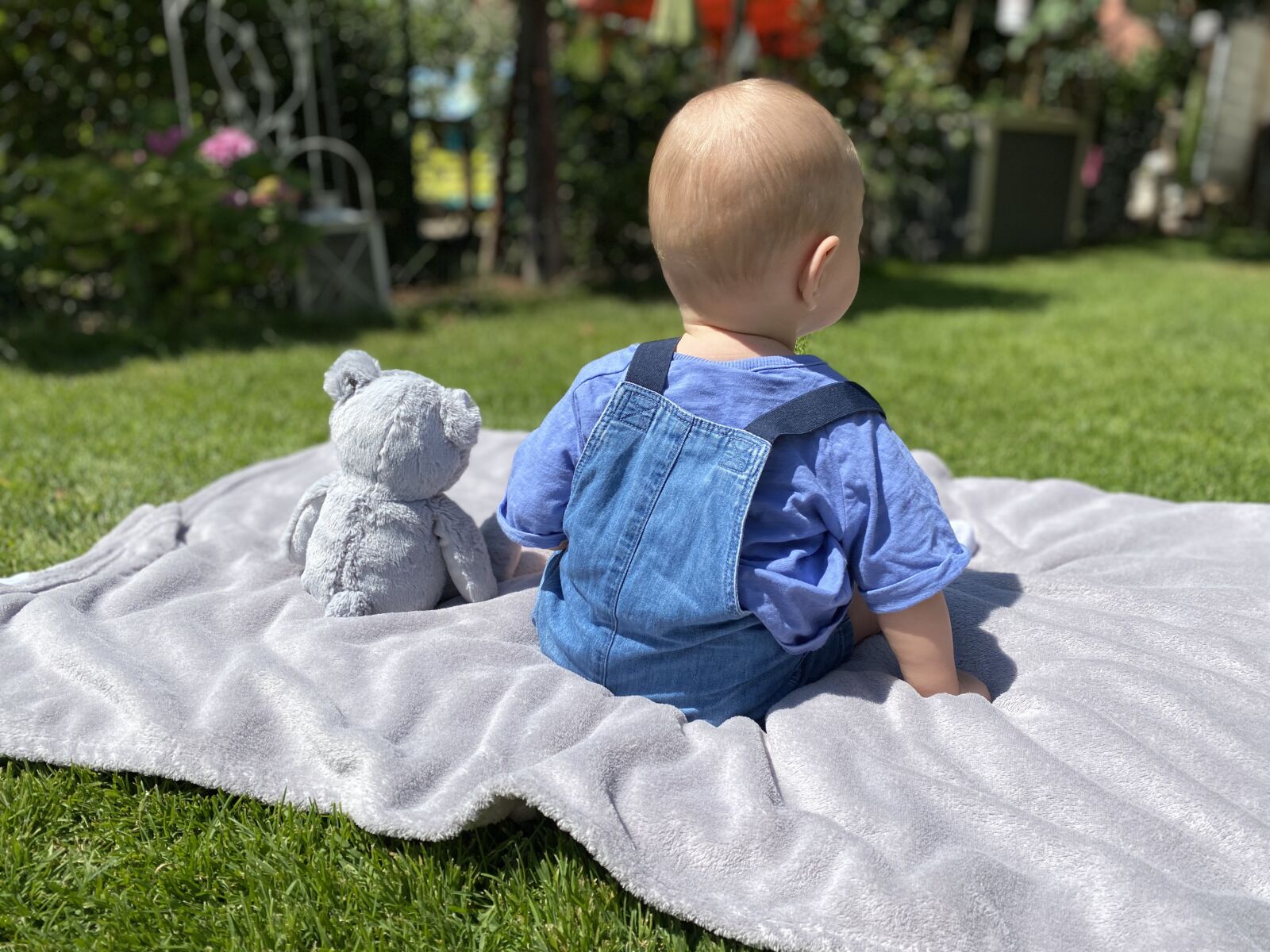 Apple iPhone 11 Pro + iPhone 11 Pro back dual wide camera 4.25mm f/1.8 sample photo. Baby and teddy, on photography