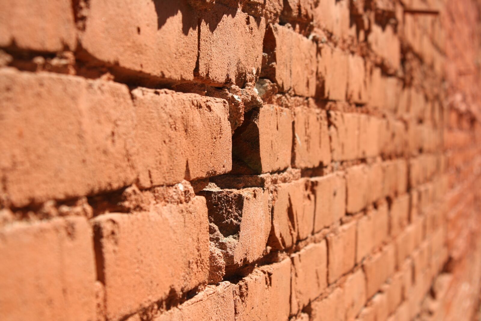 Canon EOS 1000D (EOS Digital Rebel XS / EOS Kiss F) sample photo. Brick, wall, hole photography