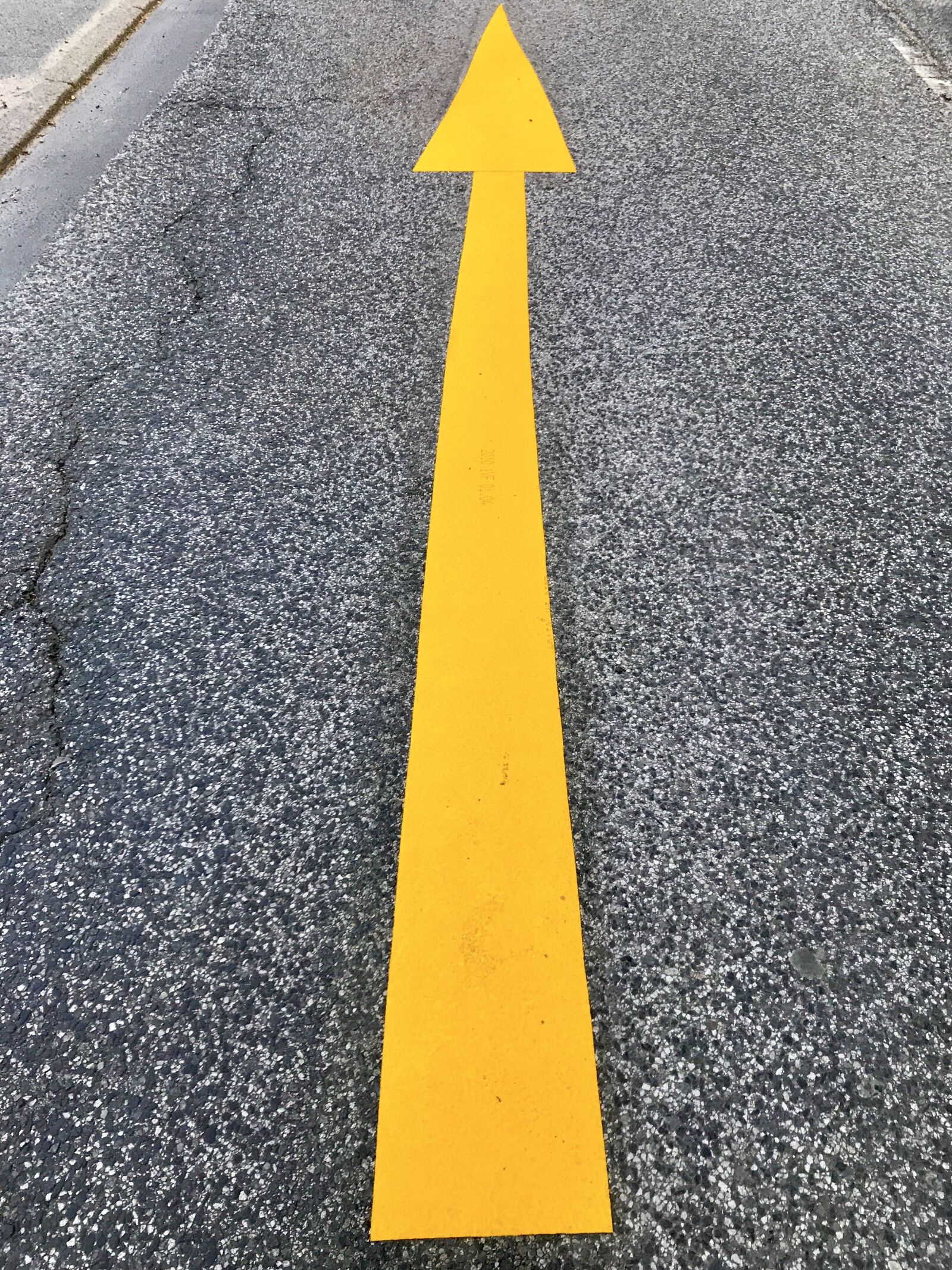 iPhone 7 back camera 3.99mm f/1.8 sample photo. Road, yellow arrow, symbol photography
