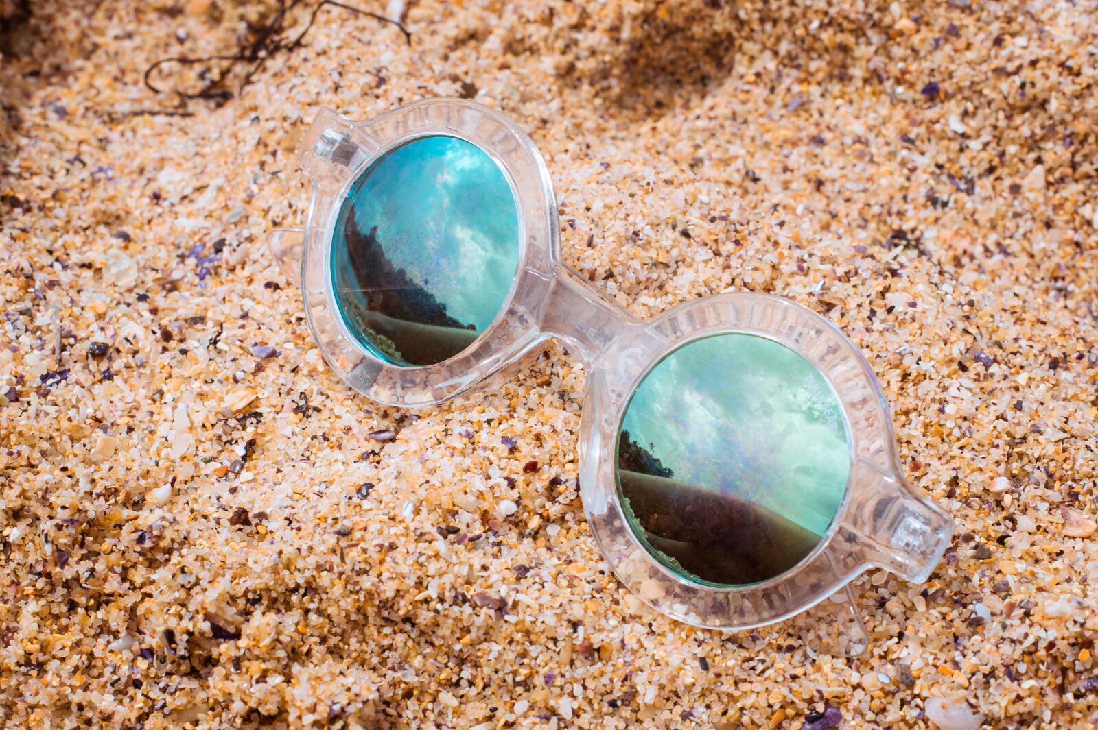 Sony Alpha NEX-5 sample photo. Sand, sunglasses, beach photography