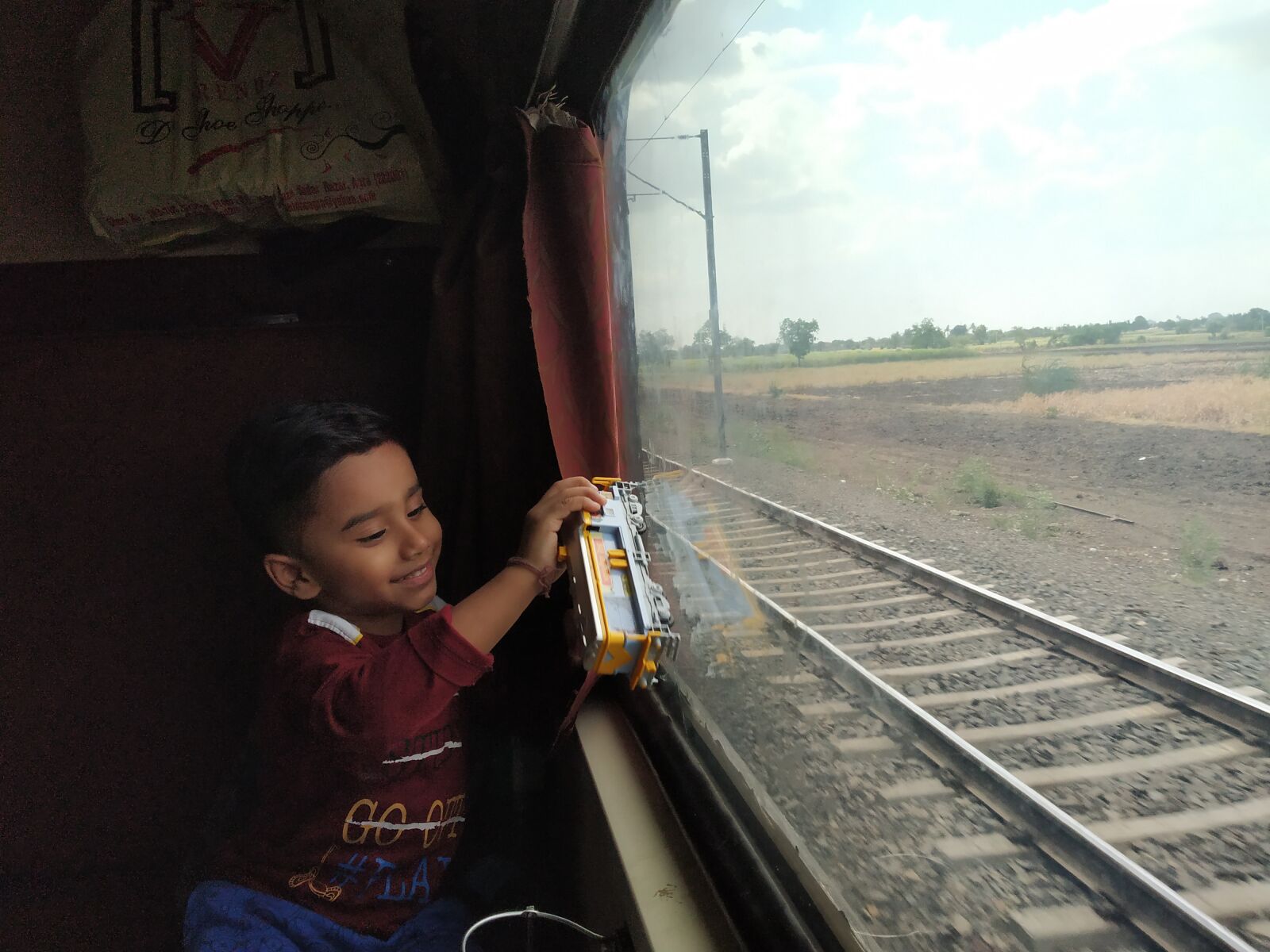 Xiaomi Redmi Note 5 Pro sample photo. Boy, train, toy photography