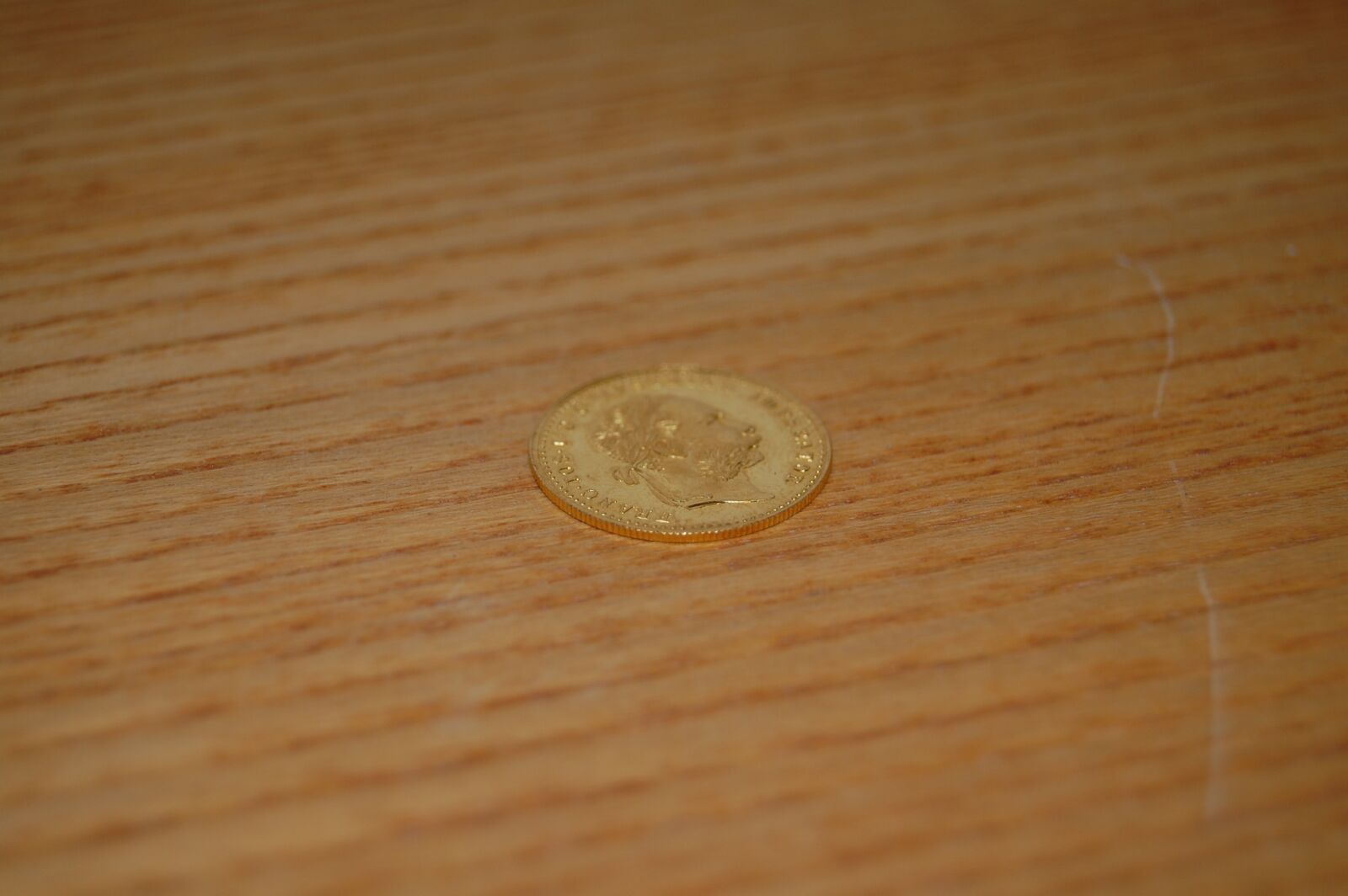 Nikon D40 sample photo. Gold, pure gold, coin photography
