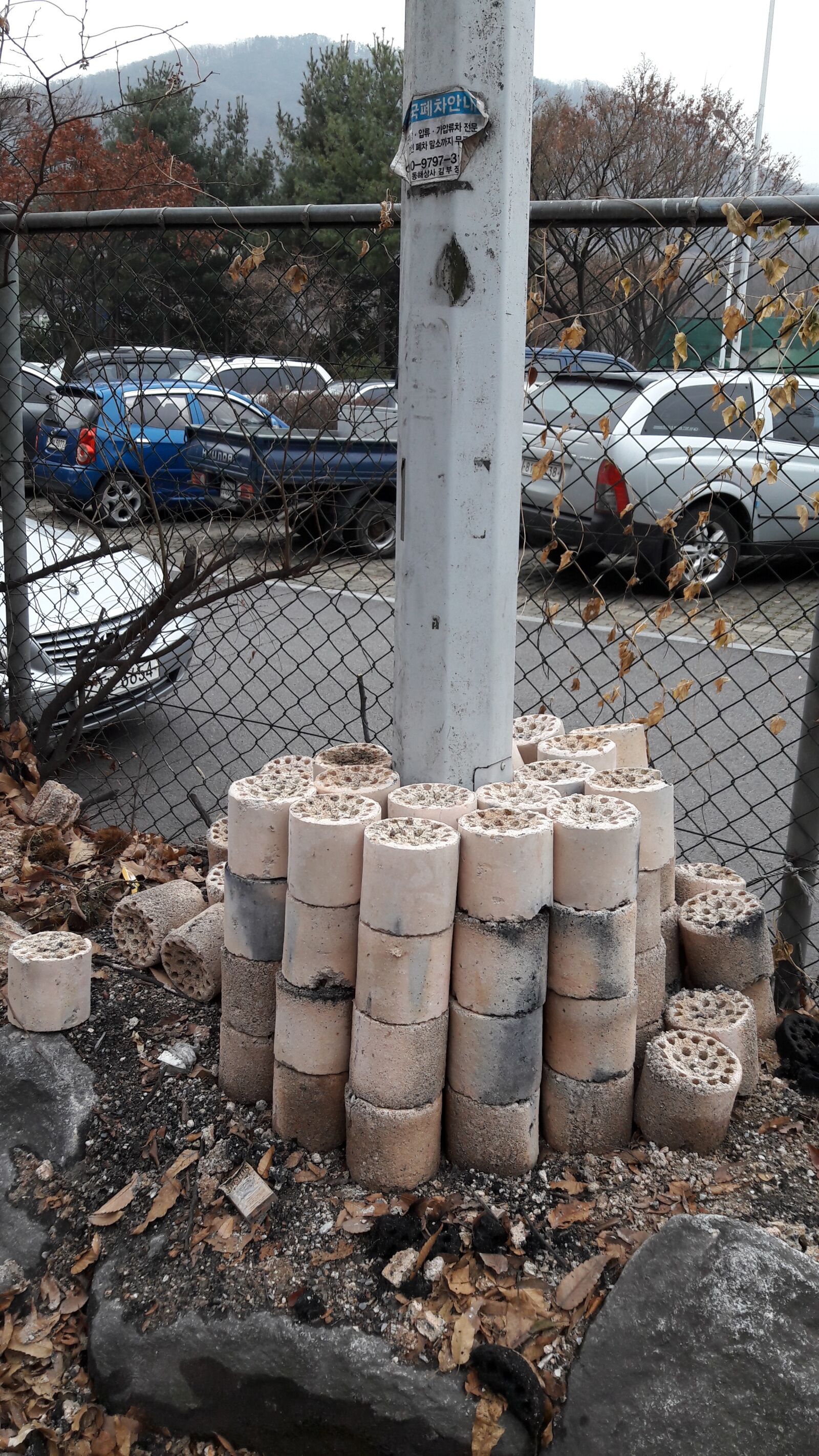 Samsung Galaxy A5(2016) sample photo. Briquettes, ashes, garbage photography