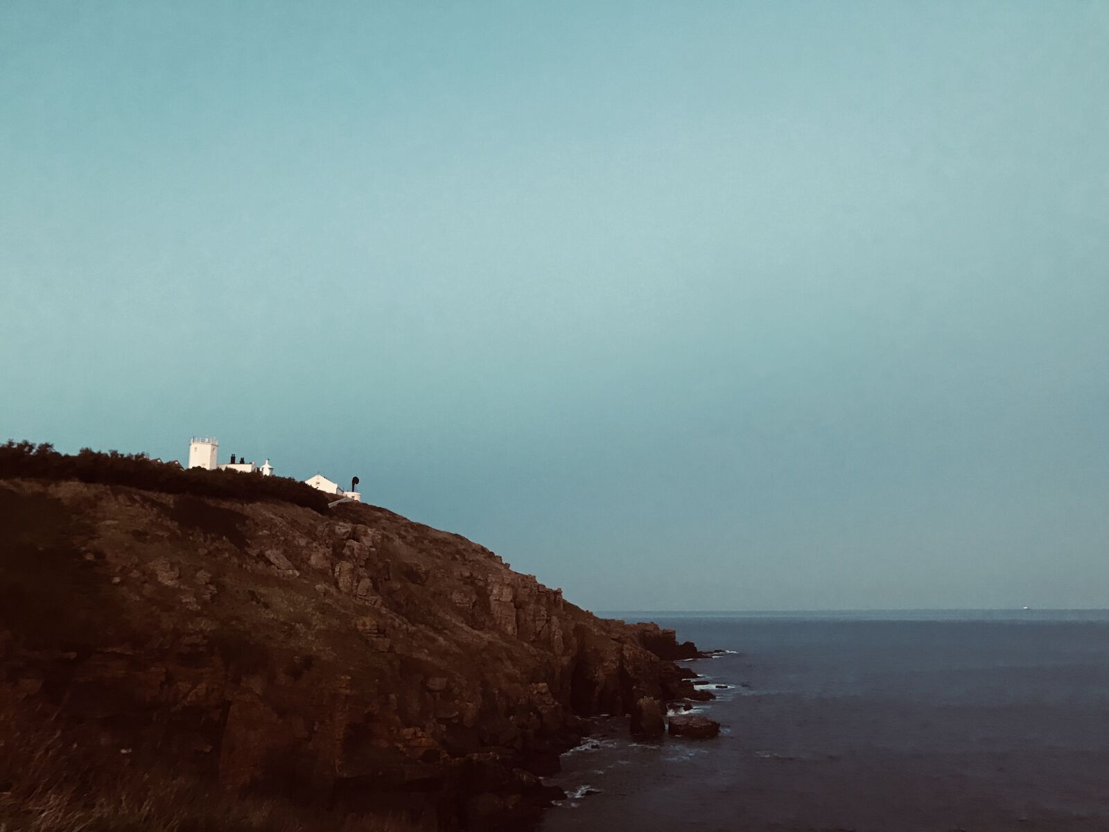 Apple iPhone 7 Plus sample photo. Cliffside, dusk, rocks photography