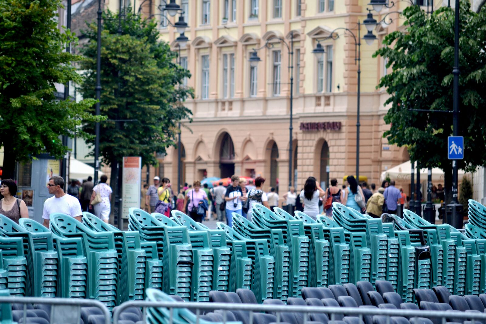 Nikon D3100 sample photo. Chairs, outside, buildings photography