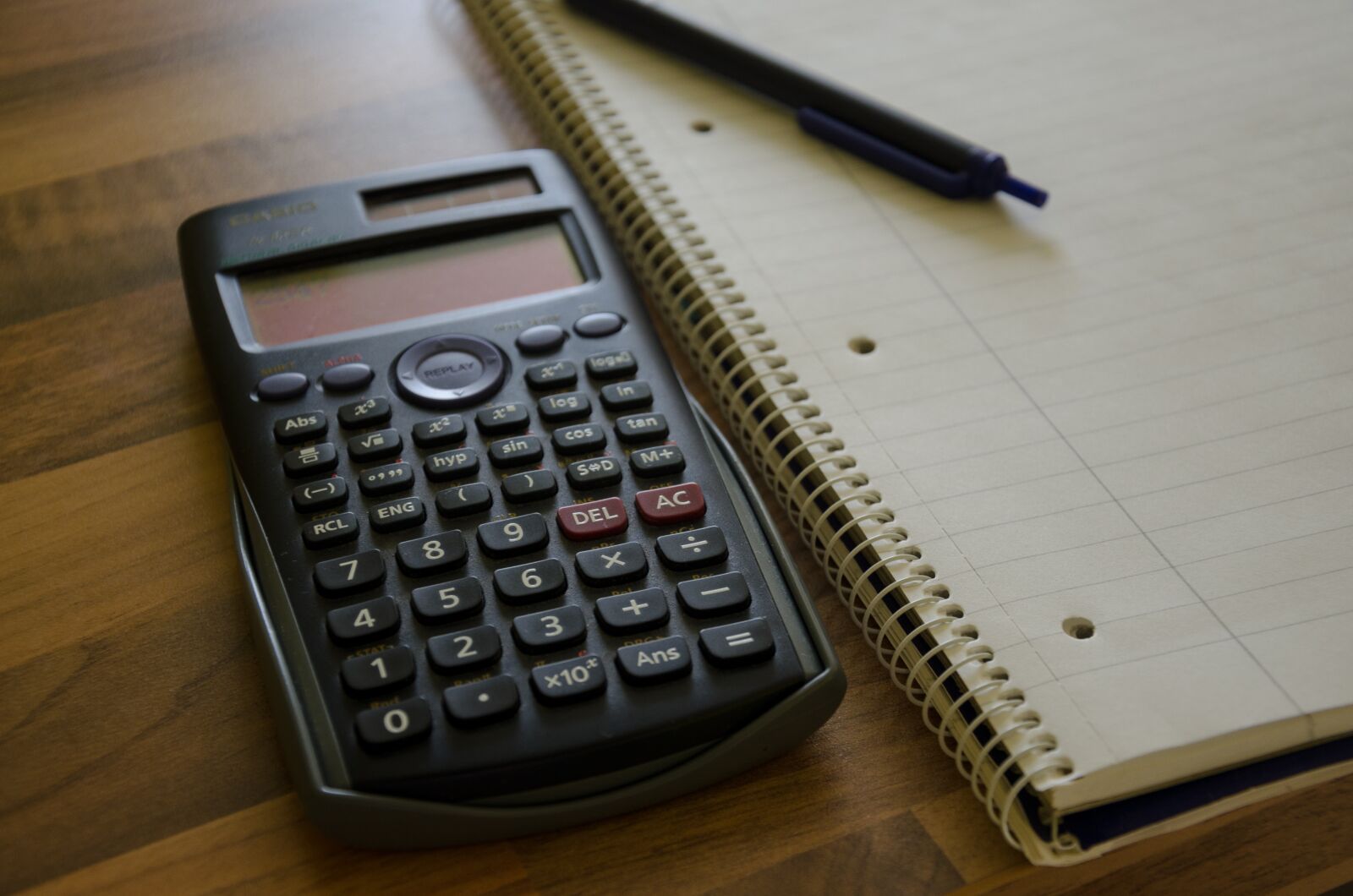 Nikon D5100 sample photo. Calculator, notepad, calculation photography