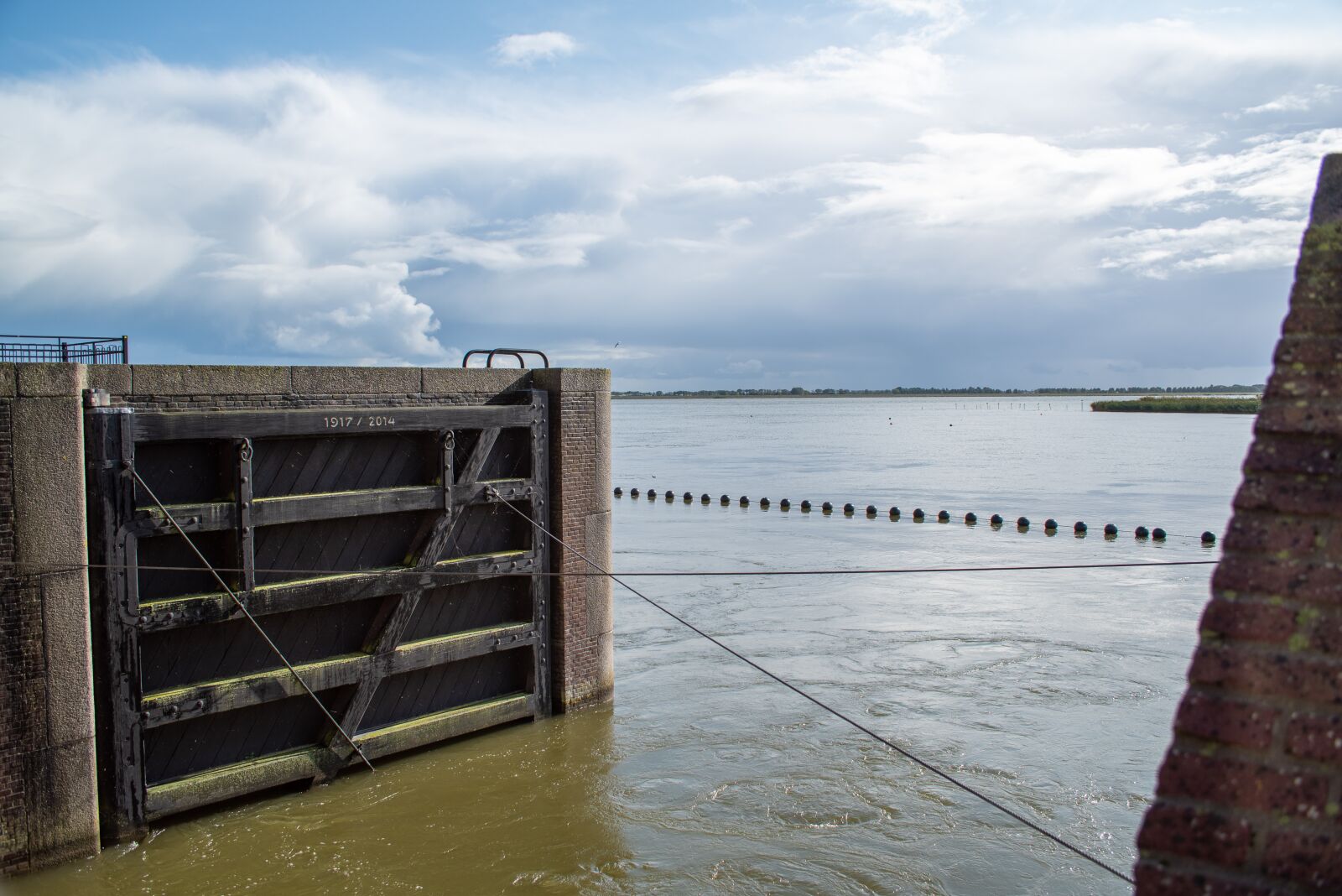 Nikon D750 sample photo. Lake, flood defense, cultural photography