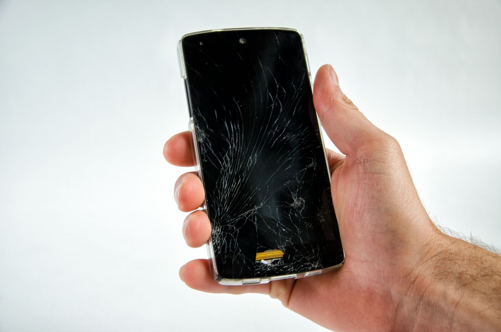 Nikon D5100 sample photo. Smartphone, broken, damaged photography