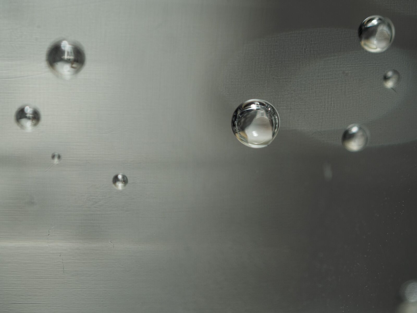 Olympus OM-D E-M10 III sample photo. Bubbles, mineral, water photography