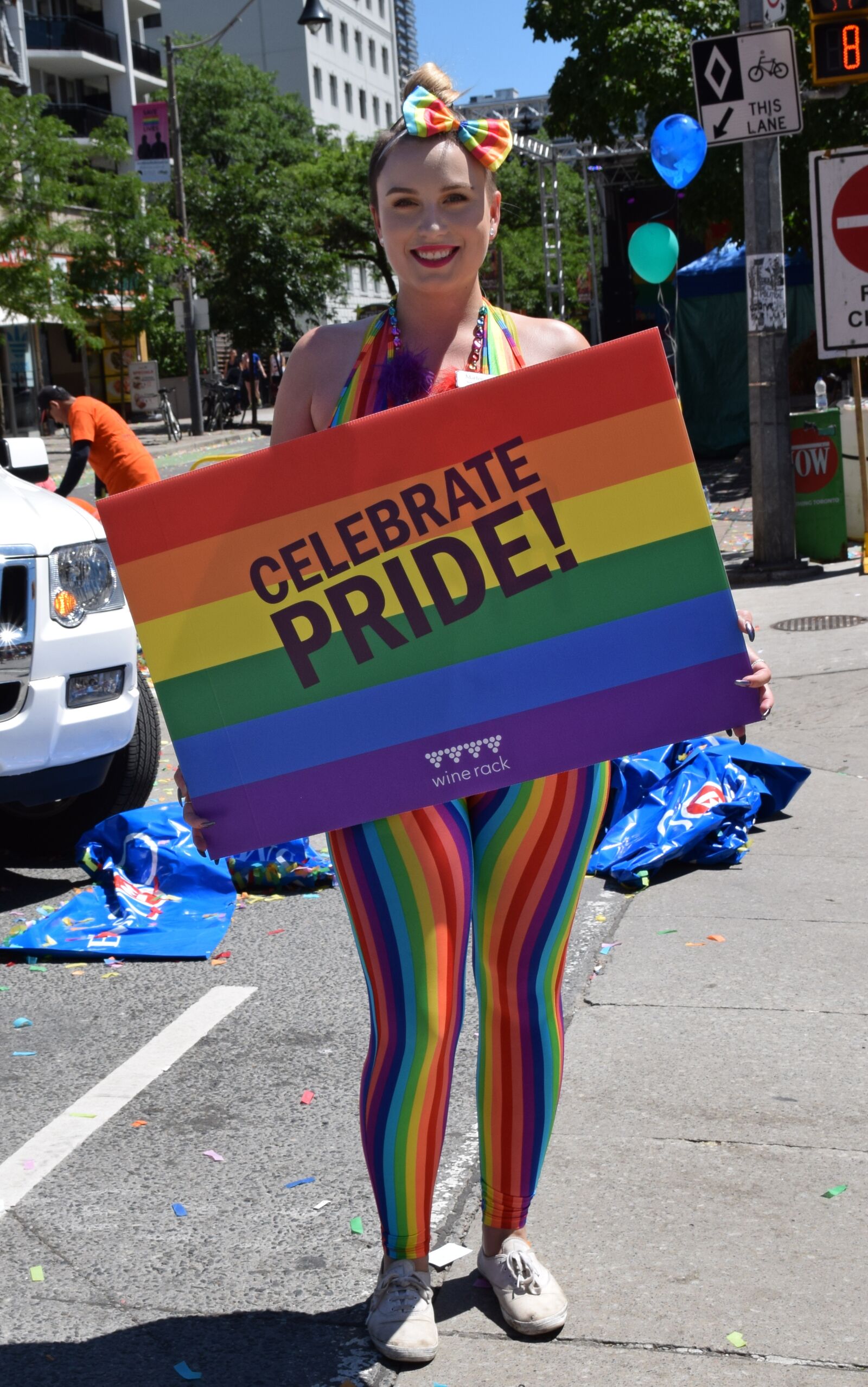 Nikon D5300 sample photo. Woman holding pride sign photography