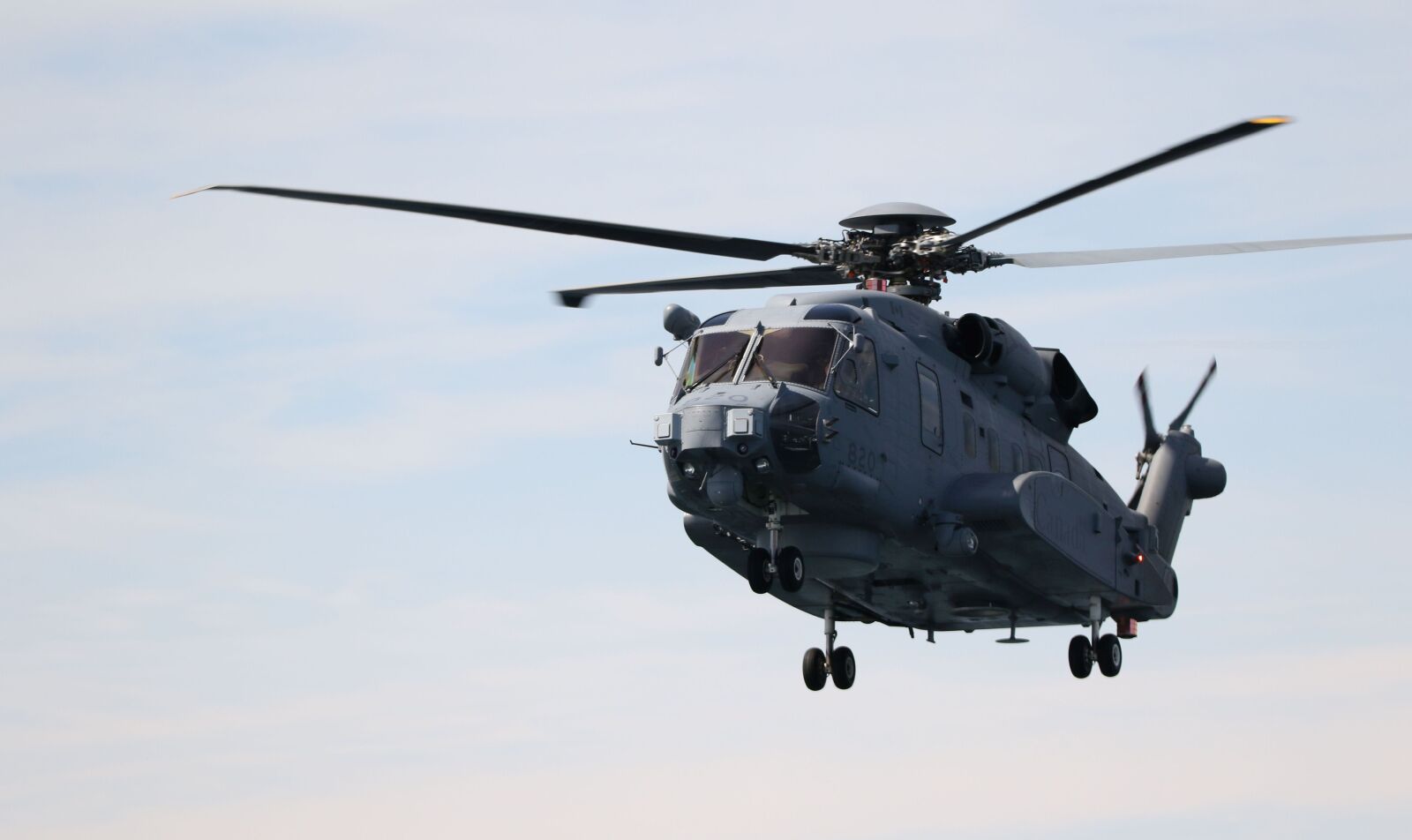 150-600mm F5-6.3 DG OS HSM | Contemporary 015 sample photo. Helicopter, flight, sea photography