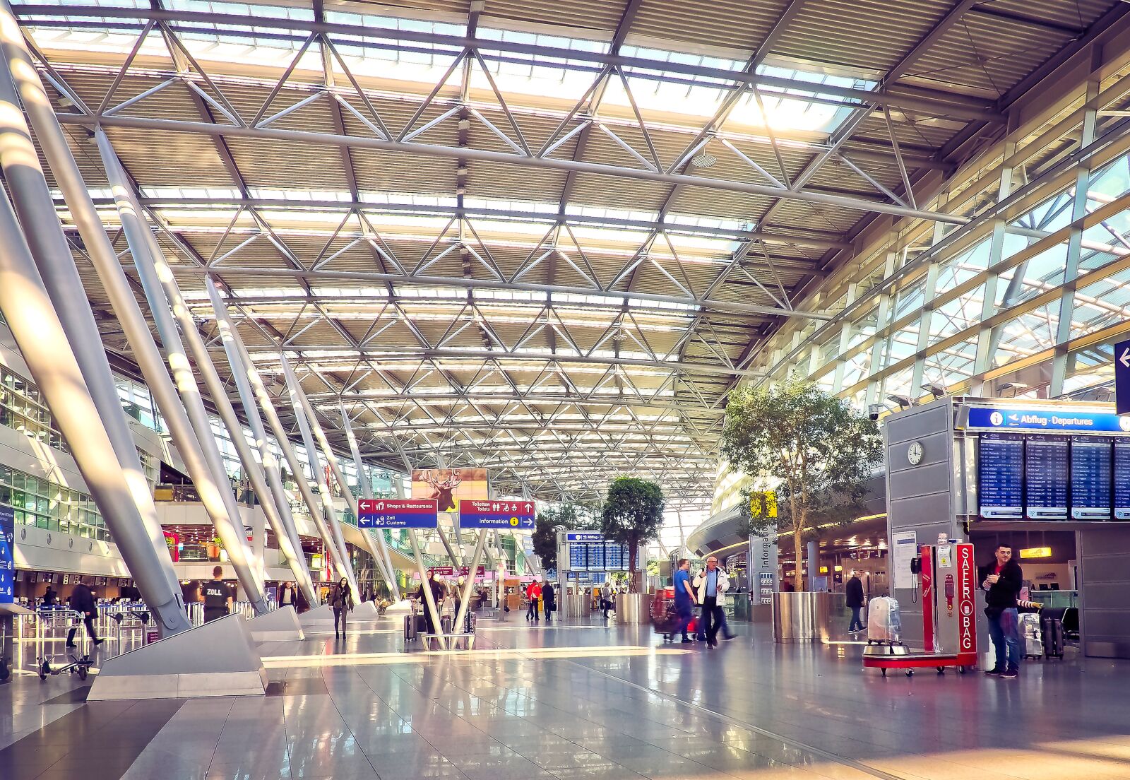 Olympus OM-D E-M10 sample photo. Airport, terminal, flying photography