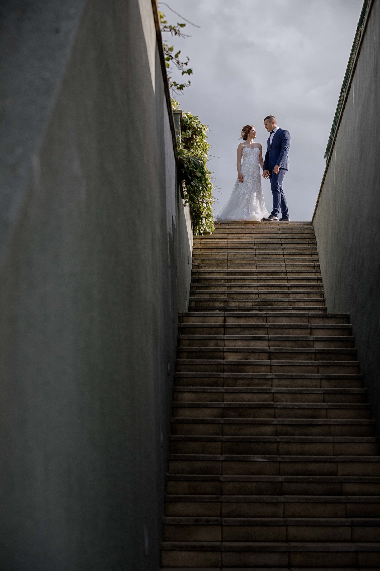 Canon EF 70-200mm F2.8L IS II USM sample photo. Groom, bride, stairs, high photography