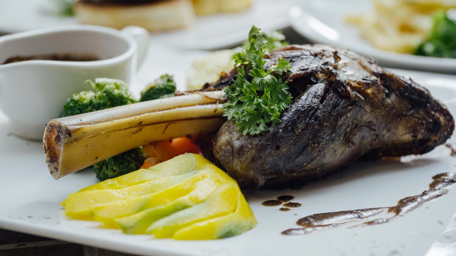 Sony a6500 + Sony E PZ 18-105mm F4 G OSS sample photo. Lamb, lamb shank, steak photography