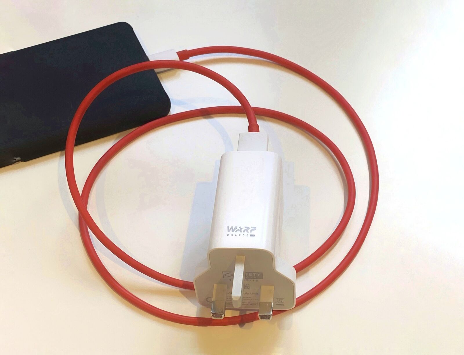 Apple iPhone 11 sample photo. Oneplus, charger, fast charging photography