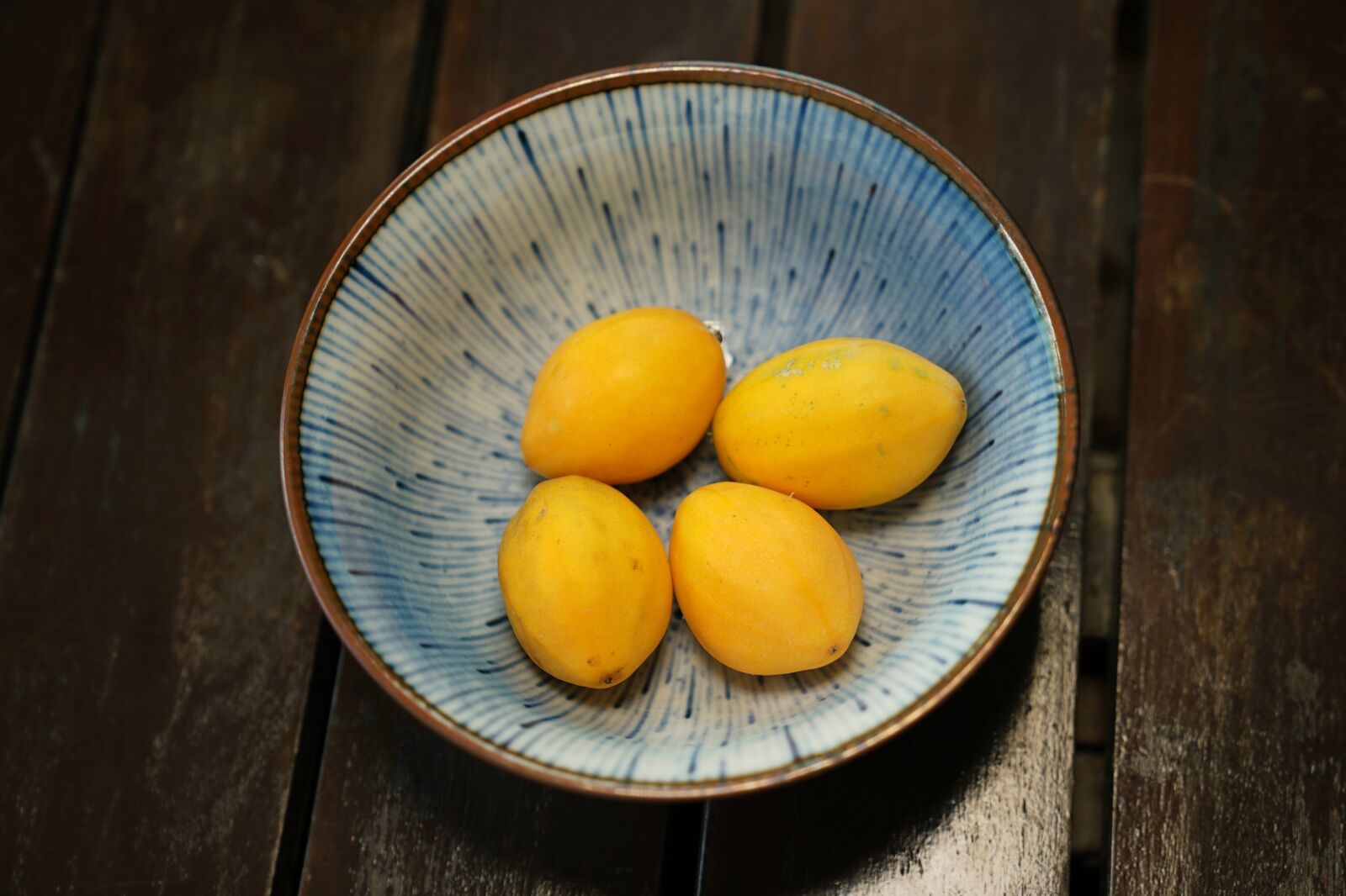 Sony a7S + Sony FE 24-70mm F2.8 GM sample photo. Golden passion fruit, bowl photography