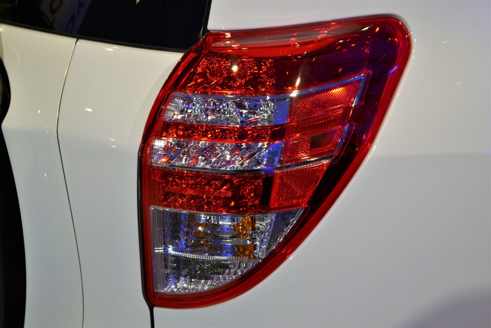 Nikon D3100 sample photo. Lexus break light, suv photography
