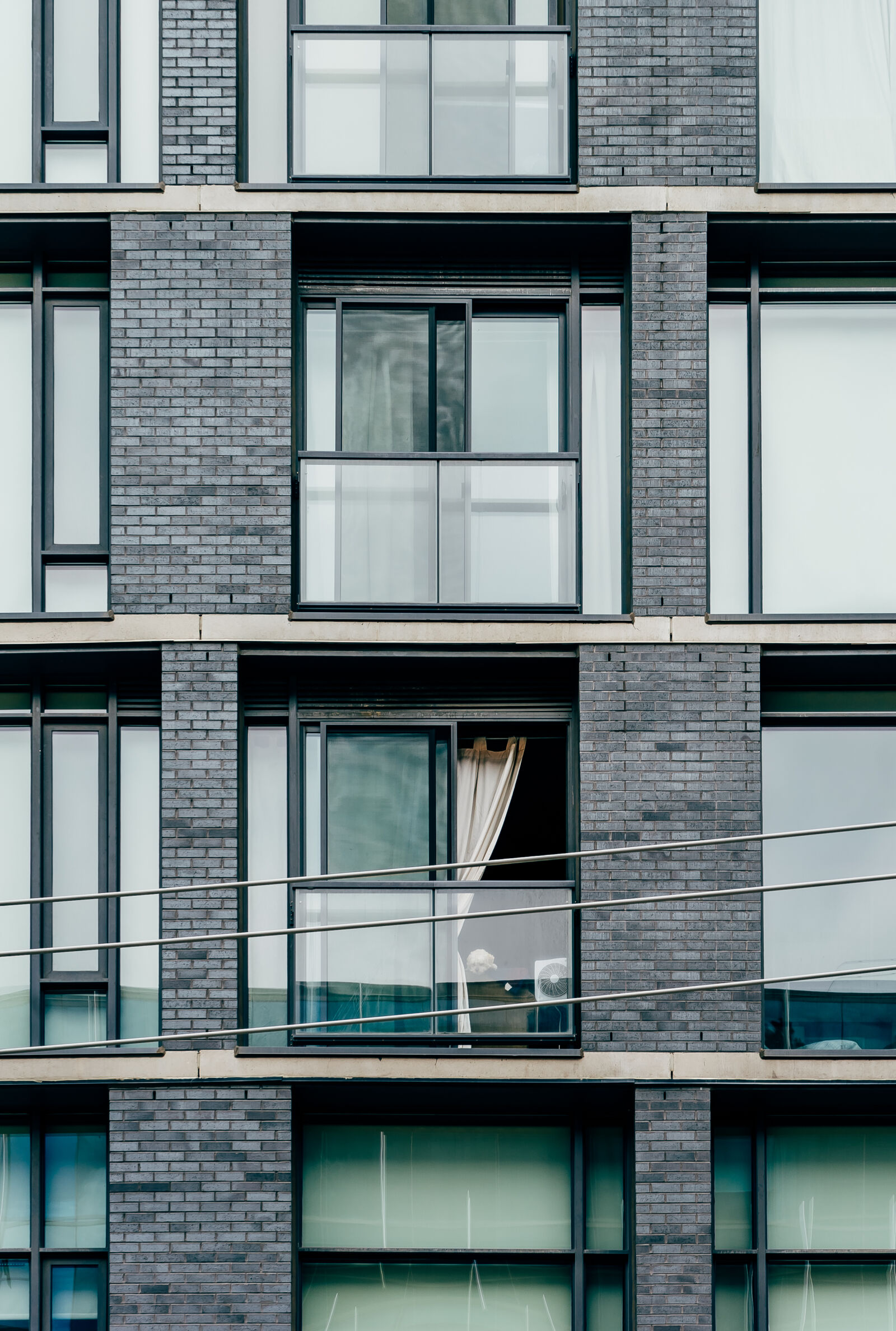 Sony a7 II + Sony FE 28-70mm F3.5-5.6 OSS sample photo. Apartment, architecture, brickwall, building photography