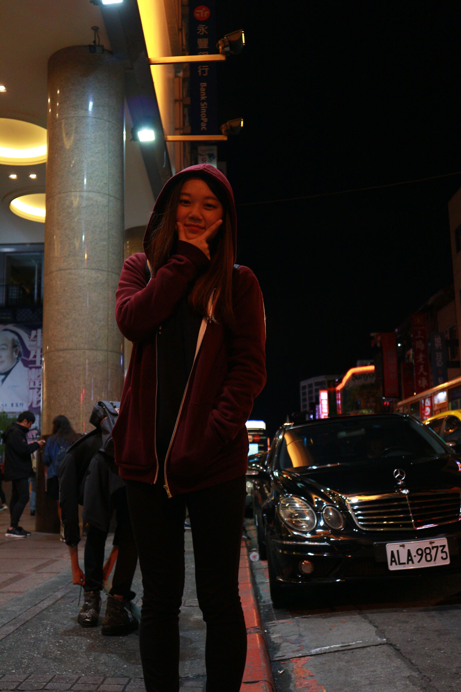 Canon EOS M sample photo. Woman, standing, at, night photography