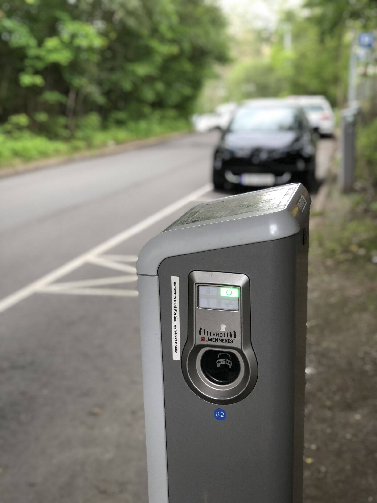 iPhone 8 Plus back dual camera 6.6mm f/2.8 sample photo. Charging station, electric vehicle photography