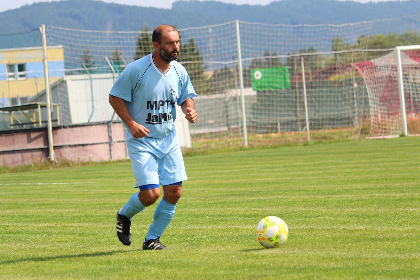 Canon EF-S 55-250mm F4-5.6 IS STM sample photo. Football, editorial, sport photography