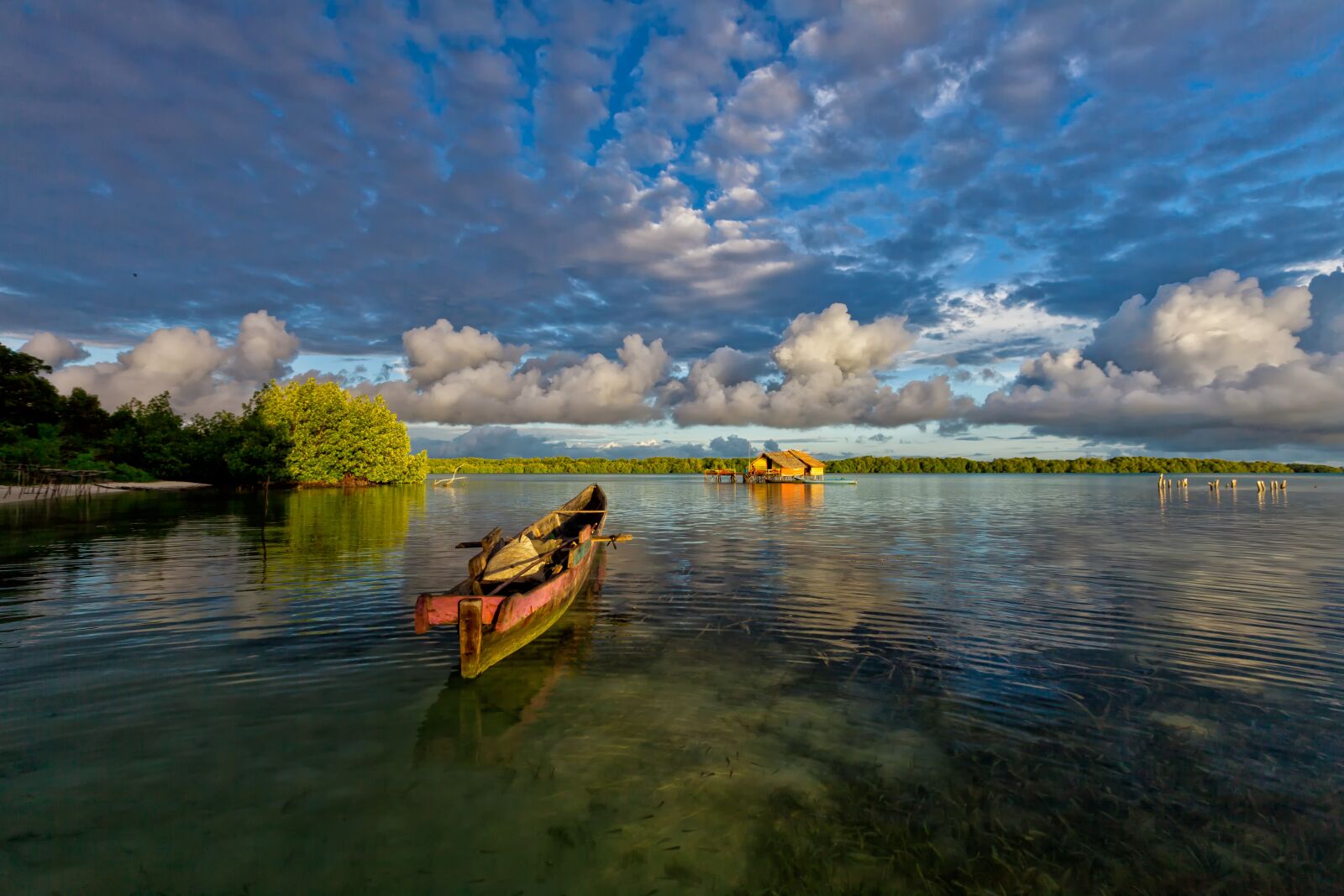Canon EOS 5D Mark II sample photo. Lagoon, boat, morning photography