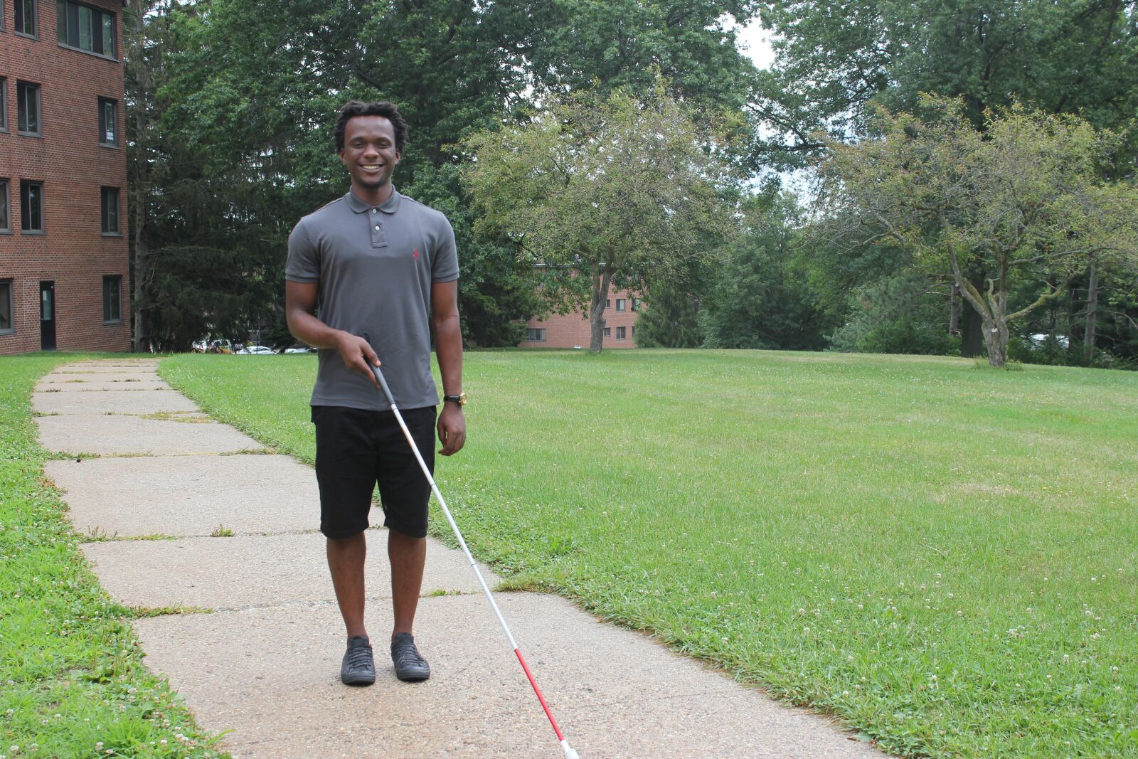 Canon EOS 550D (EOS Rebel T2i / EOS Kiss X4) sample photo. African-american, blind, cane photography