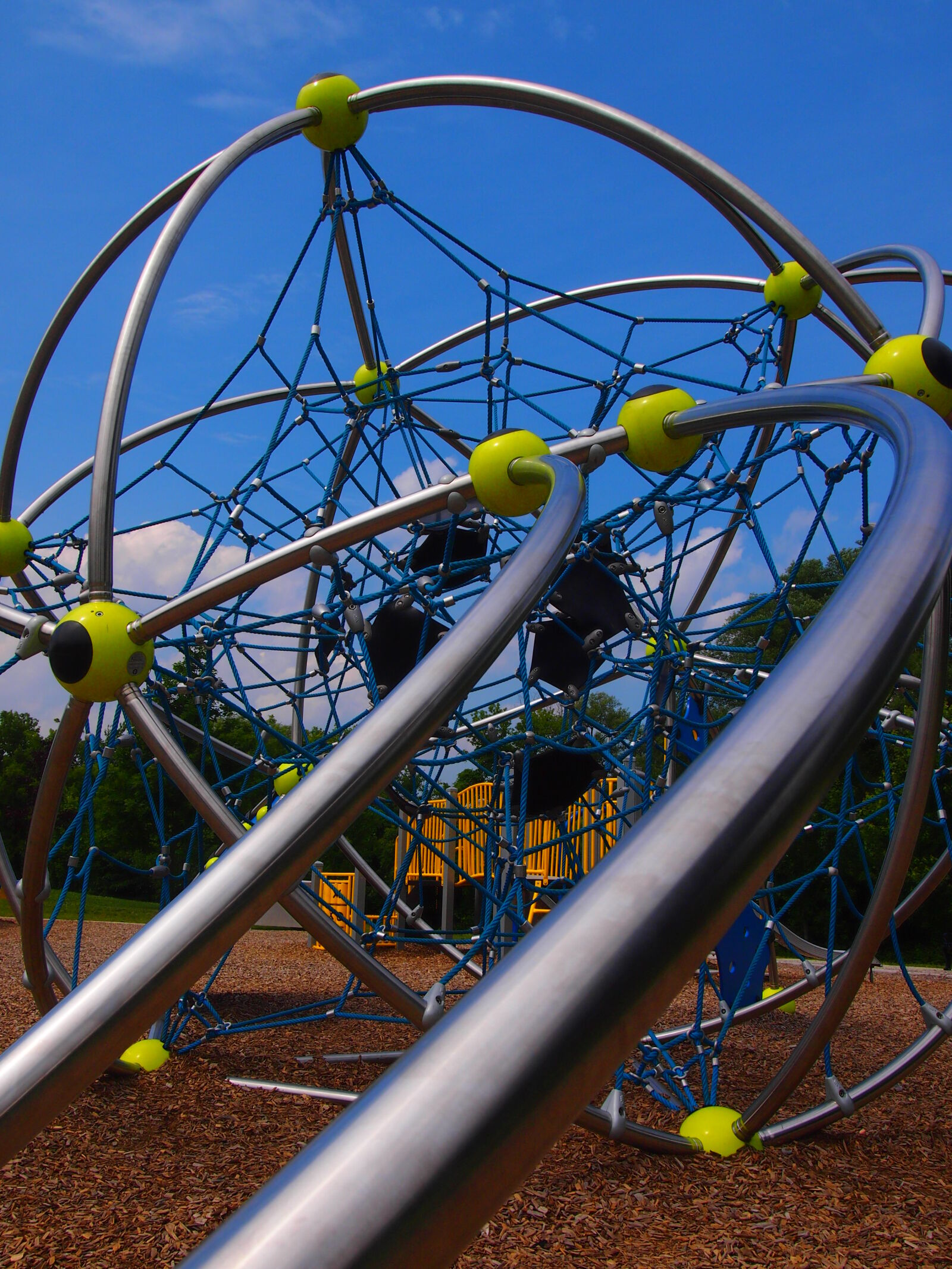 Olympus PEN E-PM1 sample photo. Abstract, climber, playground photography